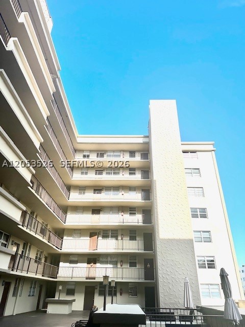 Large corner unit in Telstar Condo, ideally located in the heart of Hollywood! This 2-bedroom, 2-bathroom residence offers a comfortable and functional layout with a versatile den converted into a private office featuring a door and window—perfect for remote work, a study, or a quiet personal space. Enjoy an open living area with tile and laminate flooring throughout, direct access to a private terrace/lanai, creating the perfect spot to relax and enjoy the South Florida lifestyle. Located on the second floor, this corner unit offers added privacy, generous storage space, and a spacious walk-in closet with separate his-and-hers sections, NEW Hurricane proof windows, newer stainless steel refrigerator, granite counters, large pantry closet Newer AC & water heater.  The unit includes one assigned parking space and is located just minutes from Hollywood Beach, the famous Hollywood Broadwalk, and Downtown Hollywood’s restaurants, shops, entertainment, and nightlife.    Buyers may also qualify for first-time homebuyer assistance programs, making this an opportunity you don’t want to miss!