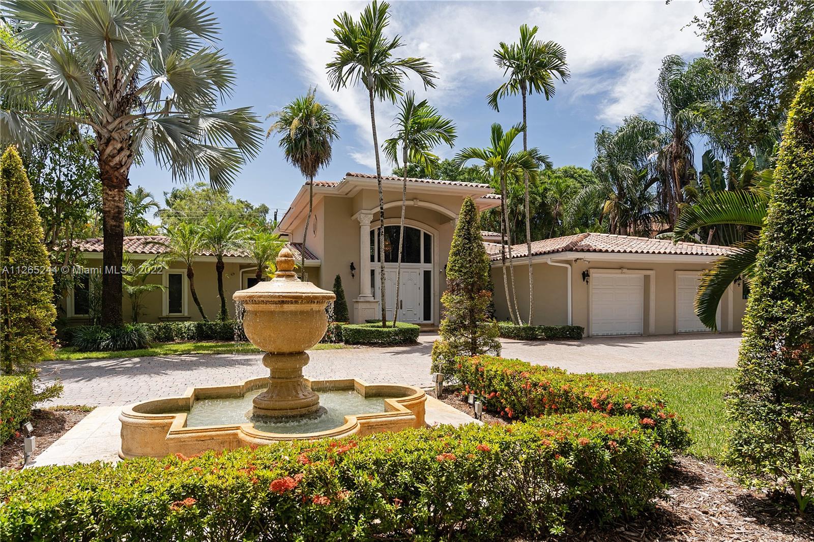 Extraordinary 5 bed/4.5 bath estate located on historic & oak-lined Coral Way on a gated 22,750 sf lot. Near the Biltmore Hotel & in close proximity to Downtown Gables, parks, golf, prestigious private schools, upscale dining & shopping. Grand foyer entrance & elegant formal living, high ceilings, beautiful staircase, impact windows/doors & ample natural light. Gourmet kitchen with island, Subzero & Thermador appliances. Wine cooler. Master suite overlooking gardens & offers 3 walk-in closets, separate water closets, double sinks, steam shower & jacuzzi. Upstairs second family room & terrace. Marble & hardwood floors. Generator, 2 Car Garage, Laundry Room, Sprinklers & more. Exquisite backyard with full summer kitchen, Lion BBQ, gas range, pool, ample green space & large covered terrace.