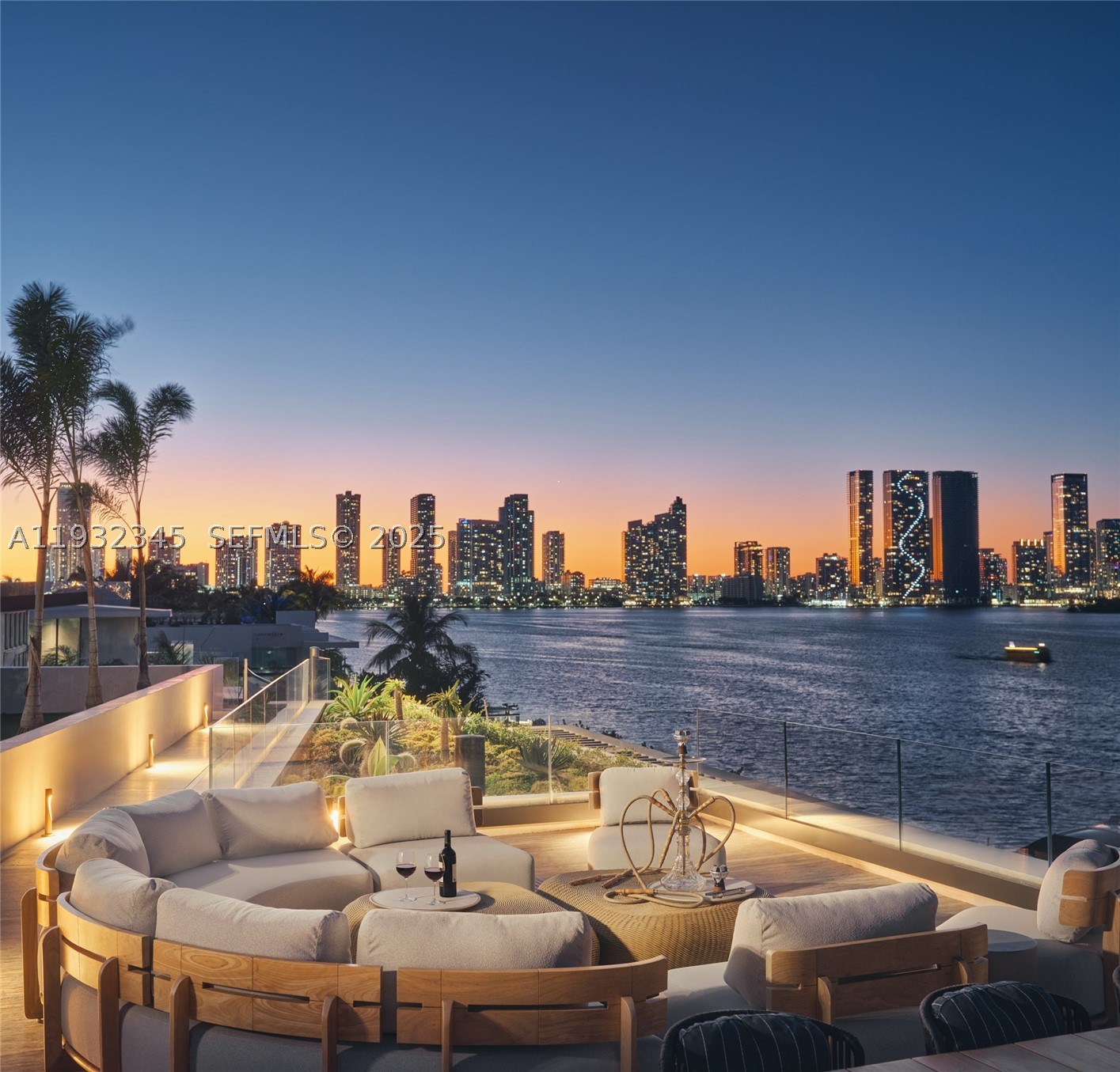 One of the most exceptional waterfront residences in Miami. This striking architectural estate offers 10,689 SF of luxurious interior living plus an additional 8,000 SF understory, featuring 7 bedrooms, 7.5 bathrooms, 12-foot ceilings, and expansive open living and entertaining spaces wrapped in walls of glass.

An elevated waterfront terrace opens to a dramatic 70ft knife-edge pool and spa, summer kitchen, and extended deck with sweeping open bay and downtown skyline views, all set behind a rare 14-foot seawall. The home includes dual kitchens (display and staff), a state-of-the-art theater, private elevator, rooftop deck, and an innovative understory accommodating up to 10 vehicles.

High-end finishes include Boffi kitchens and baths, Apure and Lumifer lighting, Ornare closets, and more. Situated on a 13,382-SF lot with 103 feet of prime waterfrontage, the property also features a new deep-water dock for a large yacht and a 30,000-lb boat lift.