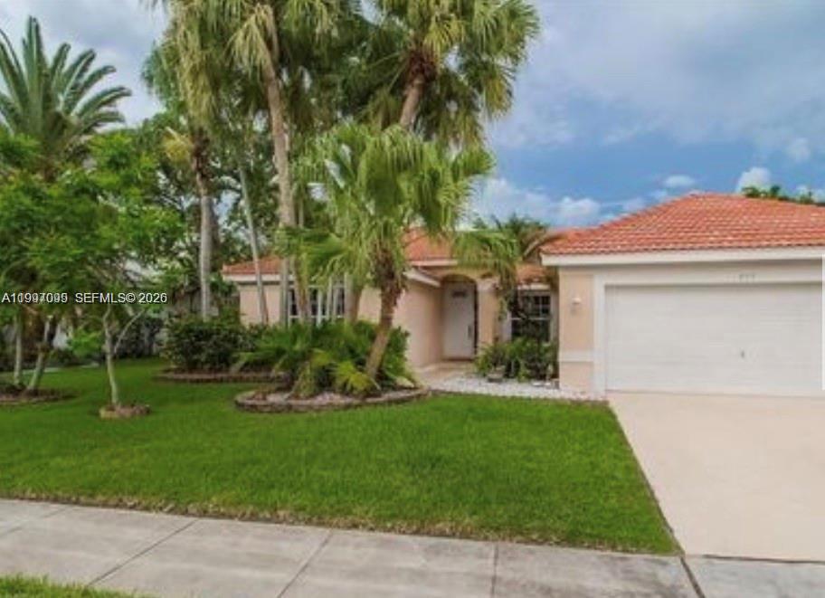 Spacious 3-bedroom, 2-bath home located in the desirable Silver Lakes community. This property features a spacious layout with a double-car garage, bright family room, and an eat-in kitchen perfect for everyday living. Enjoy outdoor living with a private terrace and ample interior spaces designed for comfort and entertaining. Silver Lakes is a well-established community surrounded by scenic lakes, parks, and walking/biking paths, offering a peaceful and active lifestyle. Conveniently located with easy access to I-75 and the Florida Turnpike, and close from shopping centers, hospitals, and schools.
