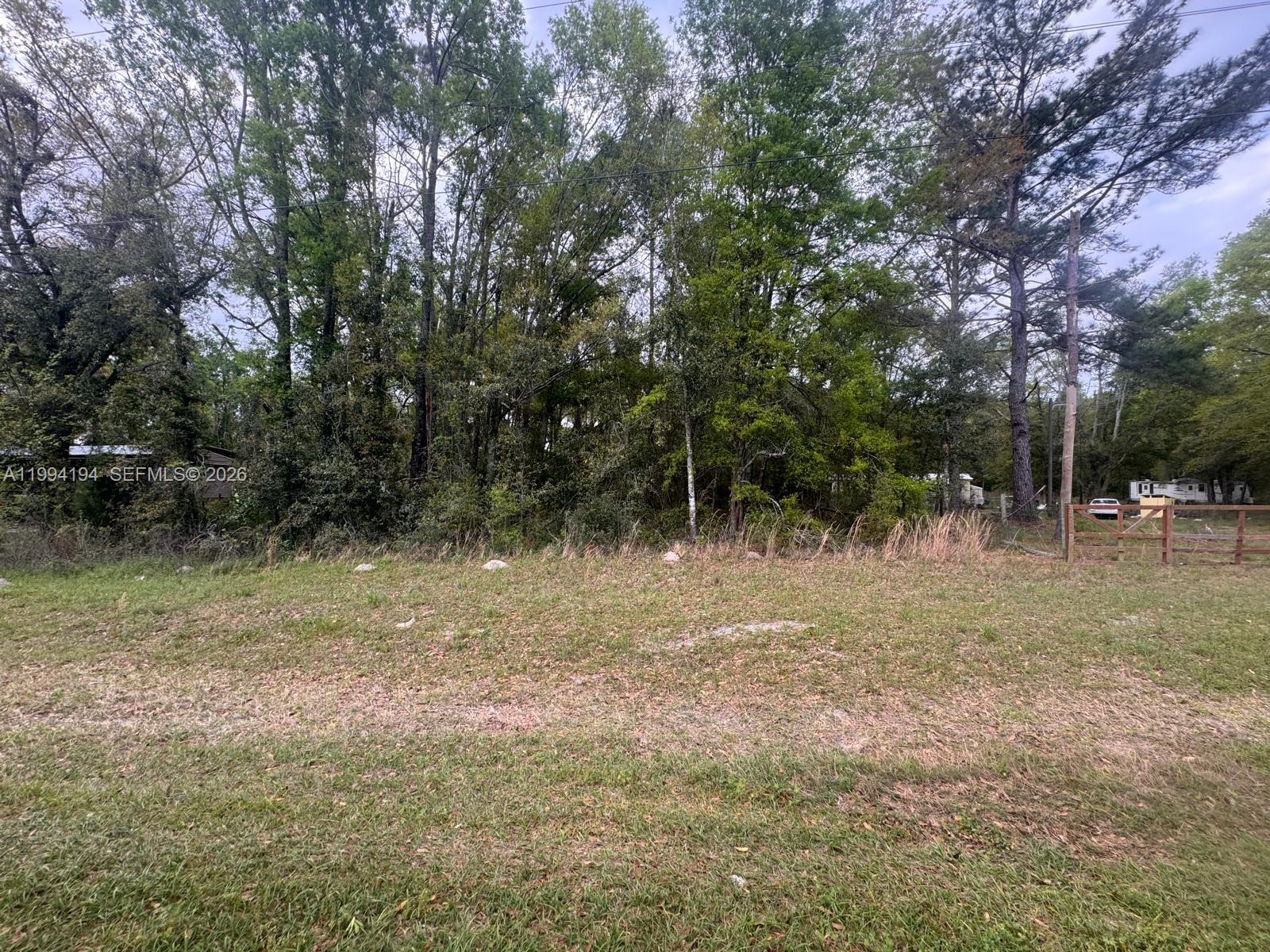 Prime investment opportunity in the growing Ocala market! This 1-acre (1 AC) parcel offers excellent potential for future development or long-term hold in a rapidly expanding area of Marion County. Surrounded by new growth and increasing demand, this property is ideal for investors looking to capitalize on Central Florida’s upward trend.

Enjoy a peaceful and private setting with convenient access to major roads, shopping, and local amenities—making it attractive for future residential use or development. With ample space and flexibility, this lot presents a valuable addition to any real estate portfolio.

Showing Instructions: Please do not call. For access and inquiries, kindly send a text message to the listing agent.