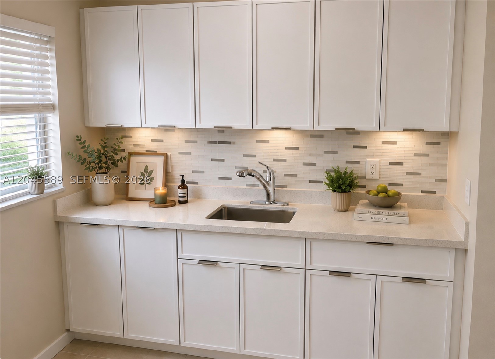 Brand New Kitchen Cabinets. Brand New Quartz Countertops. Brand New Stainless Steel Appliances. Brand New Exterior Doors, Brand New Blinds. Corner Unit. Southern Exposure. Central AC. Hurricane Shutter. Swimming Pool. Coral Ridge Area. First Floor. Building is a 2-story 10-unit Condominium. Friendly Neighbors. A few minutes drive to beach. Walk to tons of shops, restaurants and night entertainment. 1 assigned parking space. Laundry & Storage Bin On-Site. No Smoking. Small Pets OK. All Ages Welcome. Owner Realtor. Unfurnished. Pictures are staged. Annual Lease Only.