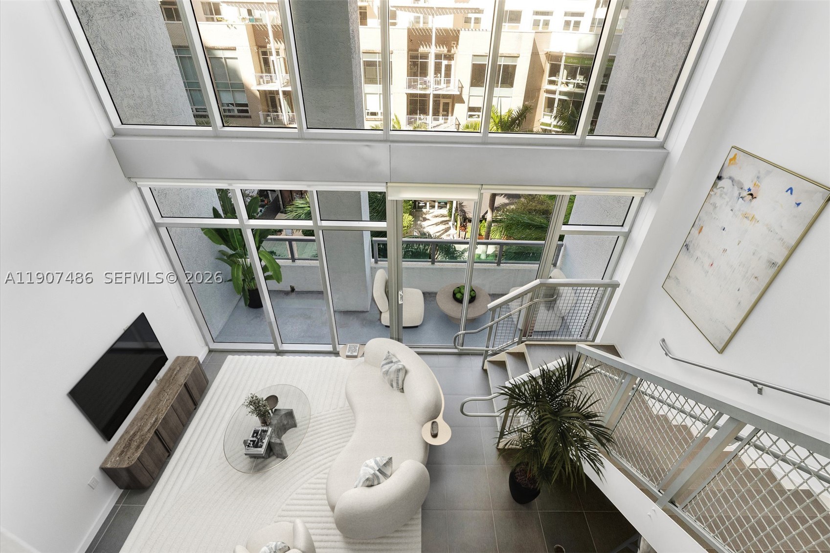 Welcome to Unit M0502 at Four Midtown Condo – a true loft living experience with soaring 30-foot ceilings and expansive windows that bathe the space in natural light. This 1-bedroom plus a versatile second bedroom/den, two-story loft is priced to sell and offers exceptional value in the heart of vibrant Midtown Miami. On the first floor, you’ll find the flexible second bedroom, currently styled as a home office, offering plenty of potential as a den, guest space, or creative retreat. 

This unit also features sleek stainless steel kitchen appliances, a spacious terrace perfect for unwinding or hosting friends, and has with 1 assigned parking space in a covered garage. Upstairs, the expansive primary bedroom provides privacy and comfort in a serene setting. Thinking ahead and wanting more livable space? Expand the second floor to add up to 400 SqFt! 

4 Midtown is a full-service condominium that features a newly redesigned lobby, a state-of-the-art fitness center, and beautifully updated common areas, all within a pet-friendly community. Enjoy unparalleled convenience with some of the finest restaurants, shops, and nightlife right at your doorstep in Midtown, Wynwood, and the Miami Design District.