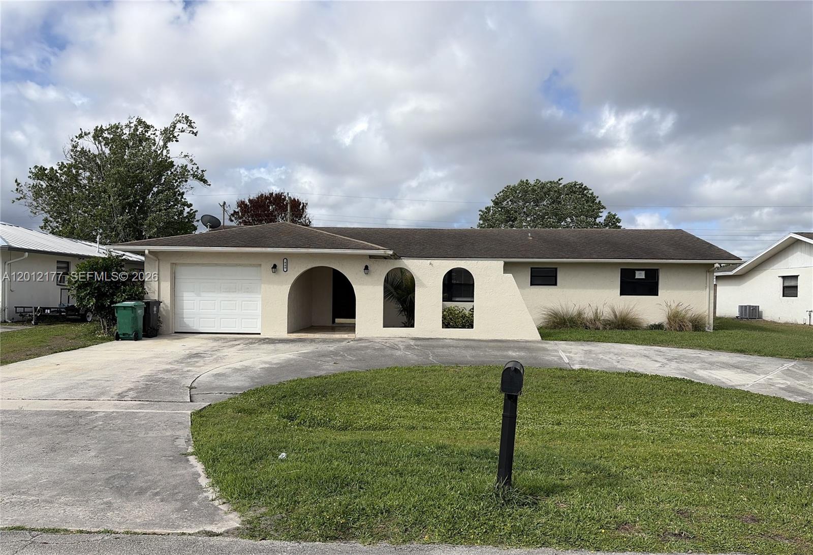 Affordable CBS home with good floor plan.  With Family Room and 3rd Full Bath off covered screened in patio for your next family get together or future swimming pool.  Other features include garage, upgraded Primary  Bathroom, and hurricane shutters.