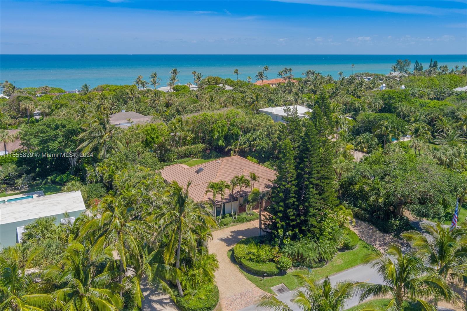 This inviting property is situated on the prestigious Jupiter Island. Consisting of three bedrooms, three and a half bathrooms, and an office. The open-plan house boasts 20-foot-high coffered ceilings, creating the perfect atmosphere for entertaining with timeless appeal.  The outdoor area features a beautifully designed swimming pool, ideal for relaxing and enjoying this private and peaceful hideaway. With its elegant design and prime location, this property is the ideal coastal oasis for those seeking luxury and comfort. The opportunities here are endless!