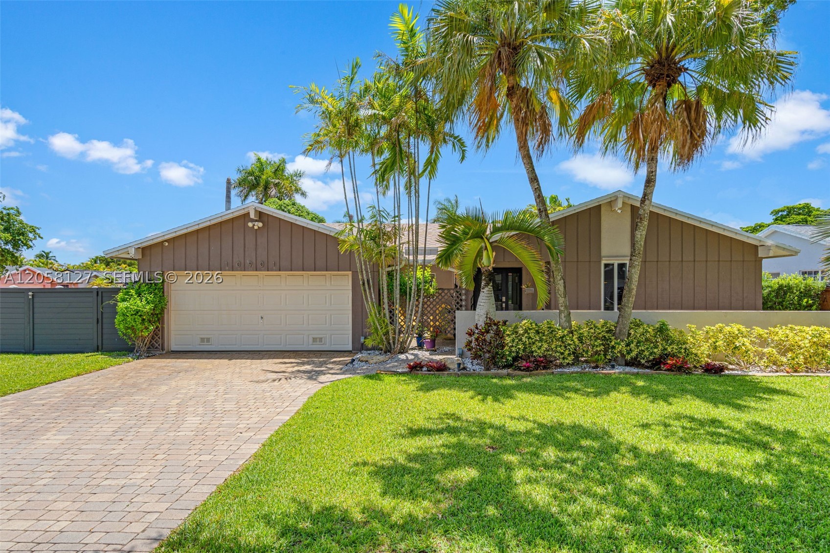 Beautifully Remodeled Pool Home in Calusa Shores Community. 3 Bedrooms 2 Bathrooms with an OPEN Floor Plan and a 2 Car Garage. Impact Windows and Doors Throughout the Entire Home. The Roof and AC Unit are ONLY 2 Years Old and the Backyard Has a Beautiful Pool, Jacuzzi, and a Travertine Tile Deck. The Lot is a Corner Unit with a Large Backyard with plenty of Side Yard for any Boat, RV, or Other Toys You Have. This Property Has Been Very Well Cared for and It Shows. This Neighborhood Has NO HOA and is Full of Wonderfully Tree-Lined Streets with this House Having 2 Gorgeous, Mature Live Oak Trees Out Front That Provide Shade to the Large, Brick Paved Driveway. Call Today for Showing Instructions.