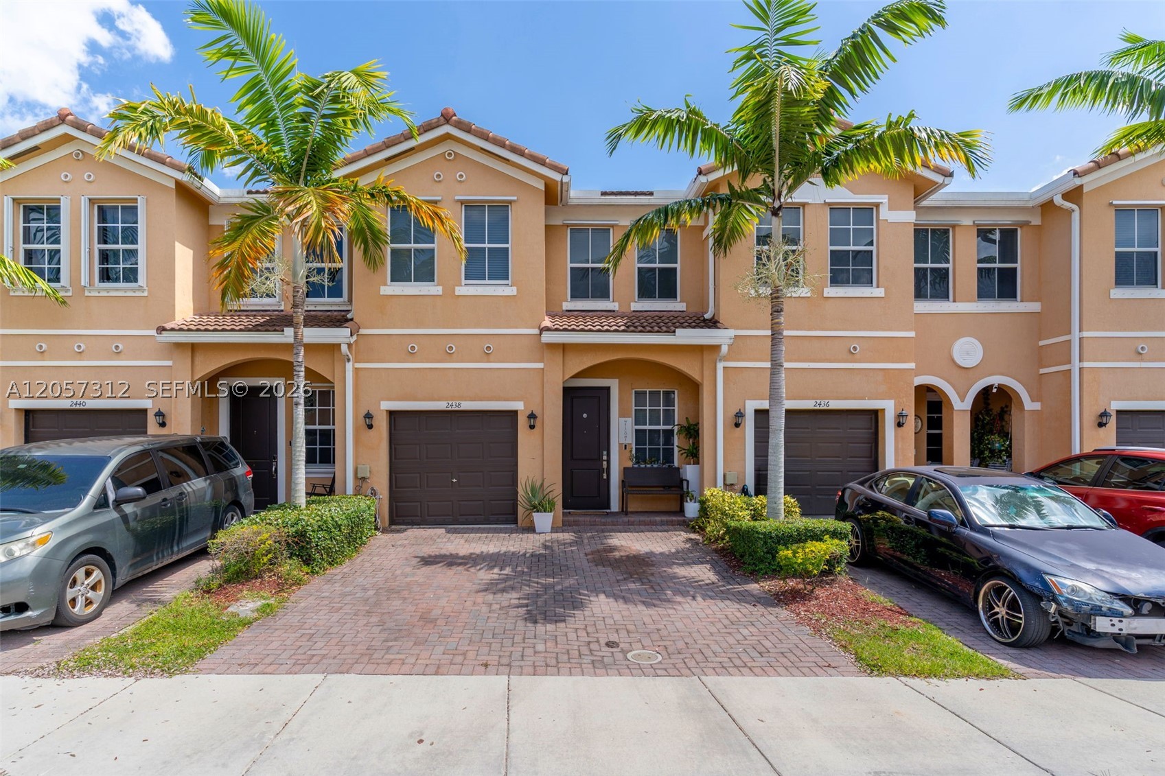 Built in 2018, this two-story lakefront home offers four bedrooms and three bathrooms with serene water views and a bright, functional layout. A first-floor entry welcomes you into an open dining and living area, complemented by a pantry and a dedicated utility and laundry room. One ground-level bedroom offers flexibility for a guest room or home office. The kitchen comes fully equipped with a refrigerator, electric range, dishwasher, microwave, and disposal, while the primary bath features dual sinks. Tile flooring runs throughout, and central heating and cooling keep the home comfortable year-round. Enjoy a private patio overlooking the lake, plus a detached garage and guest parking. Residents of this gated community share access to a pool and fitness room, with cable and exterior maintenance included in the association fee. Minutes from Homestead shopping, dining, and major roadways. Schedule your showing today.