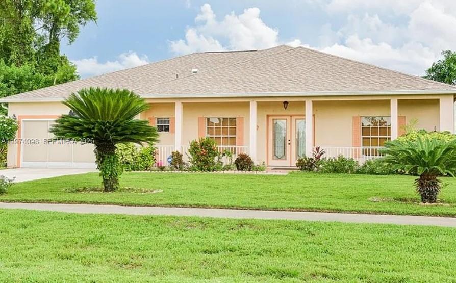 Welcome to this charming single family home located in the heart of Leigh Acres Florida. This well maintained home offers a comfortable layout with bright living space, spacious and inviting open front/back porch. Gross living area 2,173 Square feet. This 4 bedroom, 2 bathroom, 2 car garage sits on 0.24 acre lot. This property is ideal for first time homebuyers or investors. Conveniently close to Veterans Park, banks, schools, shopping areas and close to SR-82. No HOA. Easy to Show. All buyers must have proof of a pre qualification letter before showing.