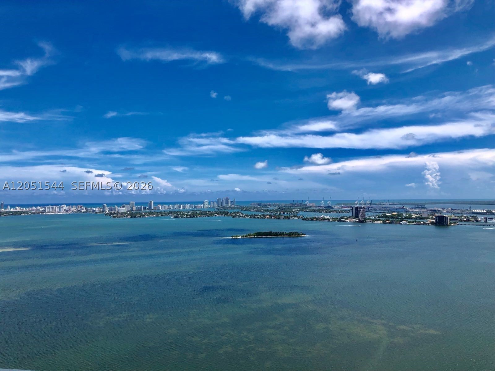 1 bed/2 bath + Den corner unit in Paraiso Bay with stunning water views from every angle. High end finishes & upgrades .Den has a glass enclosure which easily can be used as a second bedroom/office/study room. Motorized window treatments ,fully upgraded lighting, built out closets & movable island. Unit will be available in July. Bosch and Sub-Zero appliances. Luxurious 5 star amenities which include. State of the art Gym & Spa,Wine room, Cigar Lounge,Billiard Room,Movie theater,Children's playroom, Business Center,Lounge,100 diameter beach entry pool,Cabanas,Out door grill,2 tennis courts,Bayfront Park with docks and boardwalk. Access to private beach club only for residents. GREAT location minutes to the Beaches, Design District, Wynwood, Downtown and Brickell. 1 assigned parking space.