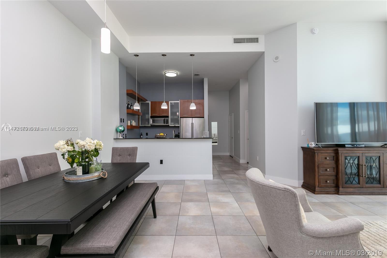 Steps from the heart of Dadeland, this 2 bedrooms 2 baths loft style high ceilings property with views of Downtown Dadeland. With over 1000 square feet this NY Style loft unit is fully remodeled and move in ready. Open kitchen with large bar area for extra seating overlooking living room with floor to ceiling sliding glass doors leading you to your extra long balcony. 2 Parking spaces, one parking is on the same floor as unit(P9), the other is free valet.  Building offers 2 pools, 2 gyms, club room, pool table, saunas, 24 hour concierge & valet. Walk to Dadeland Mall, Publix, Trader Joes, Metro Station and all up and coming restaurants.