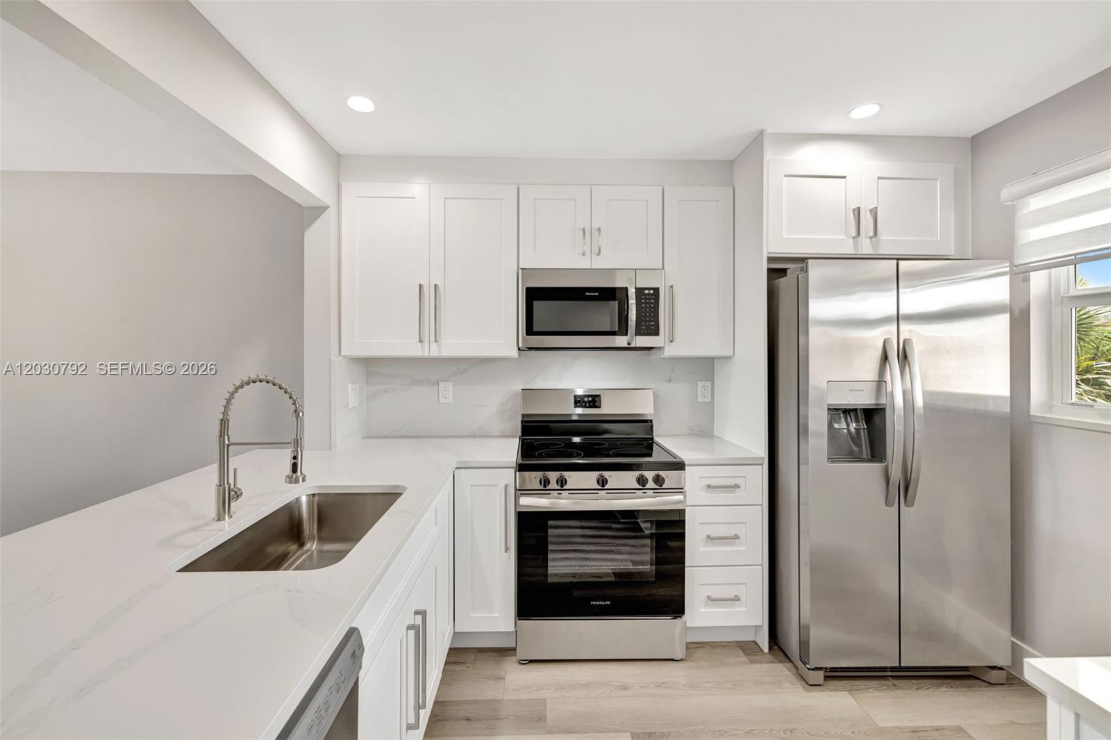 Wow! Stunning! Absolutely everything is NEW & BEAUTIFUL!!! GORGEOUS unit with 2 bedrooms & 2 bathrooms, completely remodeled (with all permits). Features include new AC, new water heater, new impact windows throughout, & a new opened kitchen. White cabinets, quartz countertops, recessed lights & new Stainless appliances. Waterproof & sunproof Vinyl wood like floor throughout the entire unit & Porcelaine tile floor on the balcony. Both bathrooms are also new & modern. All ceilings are popcorn free, flat, & new electric panel. Enjoy your large balcony with views of the pool. On the 3rd floor, nobody on top of you, far from the street. HOPA verified community with clubhouse, pool, gym, bocce ball, tennis & pickleball courts, and a picnic& BBQ area.
Comes with one parking & one storage.