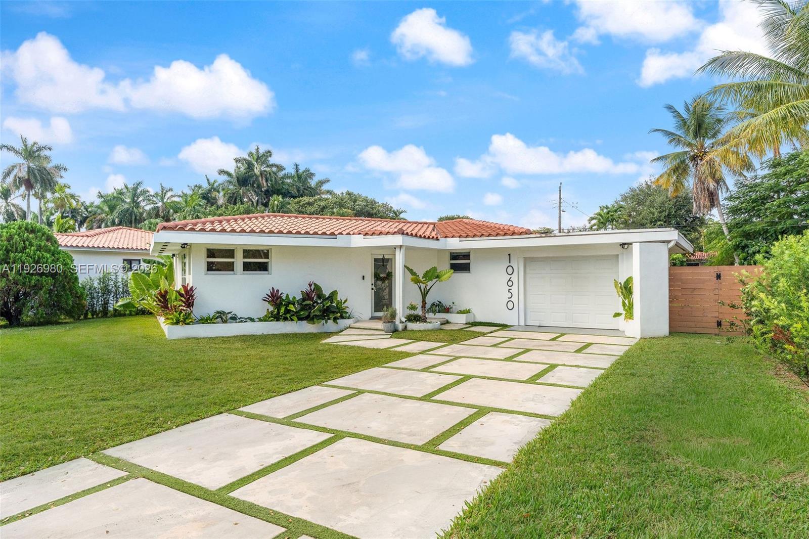 Beautifully updated single-family home situated on an oversized lot! This residence features new wood flooring throughout, a fully fenced backyard, updated plumbing and electrical systems, a security system, and custom roller shades. The property also includes fully approved pool permits, allowing for installation in as little as six weeks. Recently upgraded from septic to city sewer via the Miami Shores infrastructure improvement project. Buyer to verify bed/bath count.