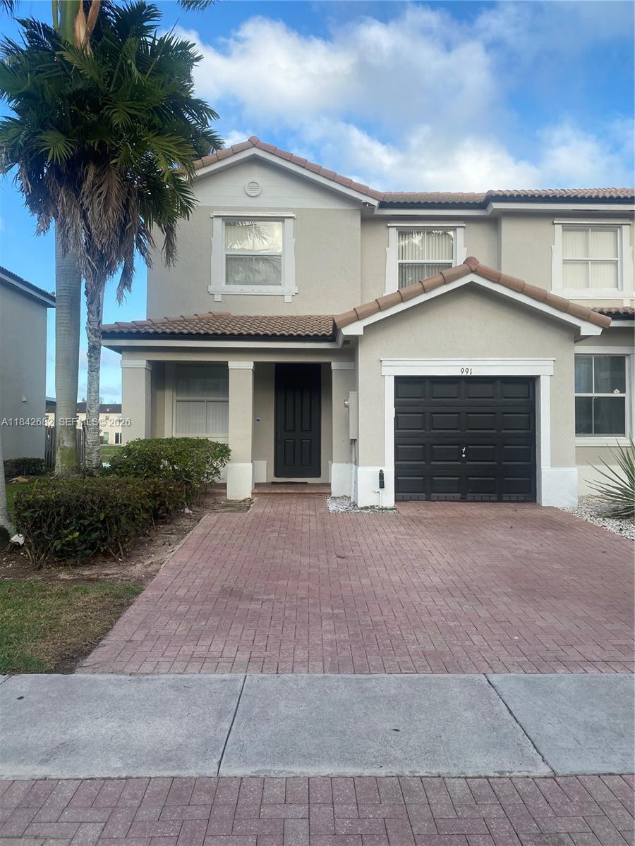 AMAZING corner unit with lake views in the exclusive community of Waterstone You can enjoy the a swimming pool, club house , lake, and charter school 24 hour security LOW HOA.