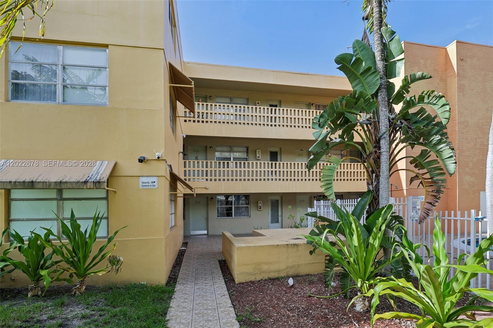 Bright and beautifully updated 1-bedroom, 1-bathroom condo located on the ground floor of the desirable Palms 51 community. This move-in-ready unit features stunning porcelain tile flooring throughout, a spacious walk-in closet, and a modern kitchen complete with solid wood cabinetry, elegant granite countertops, and stainless steel appliances. Complete with an assigned parking space, guest parking, and access to a refreshing community pool. Strategically located in North Miami Beach, close to shopping, dining, major highways, and just minutes from the beach. Tenant occupied — 24-hour notice required for showings. An excellent investment opportunity for buyers looking to retain the current tenant and generate immediate rental income. Perfect for end-users or investors! NO ASSESSMENT!