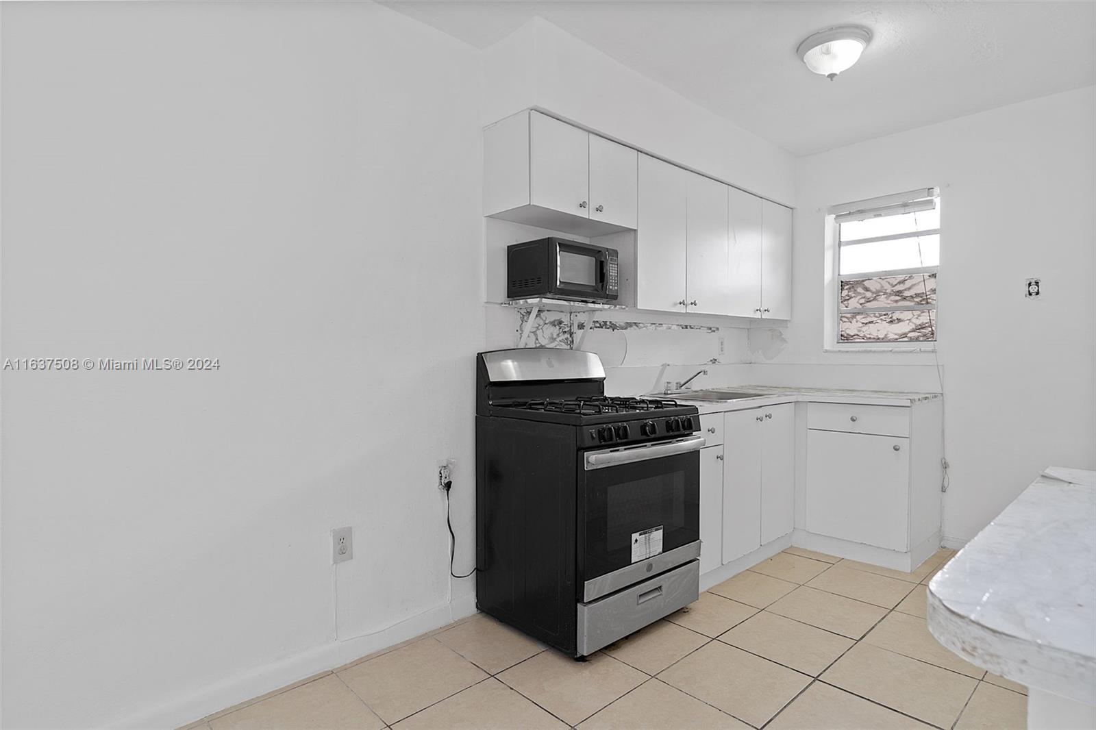 GABLES EDGE CONDO - Residential Lease