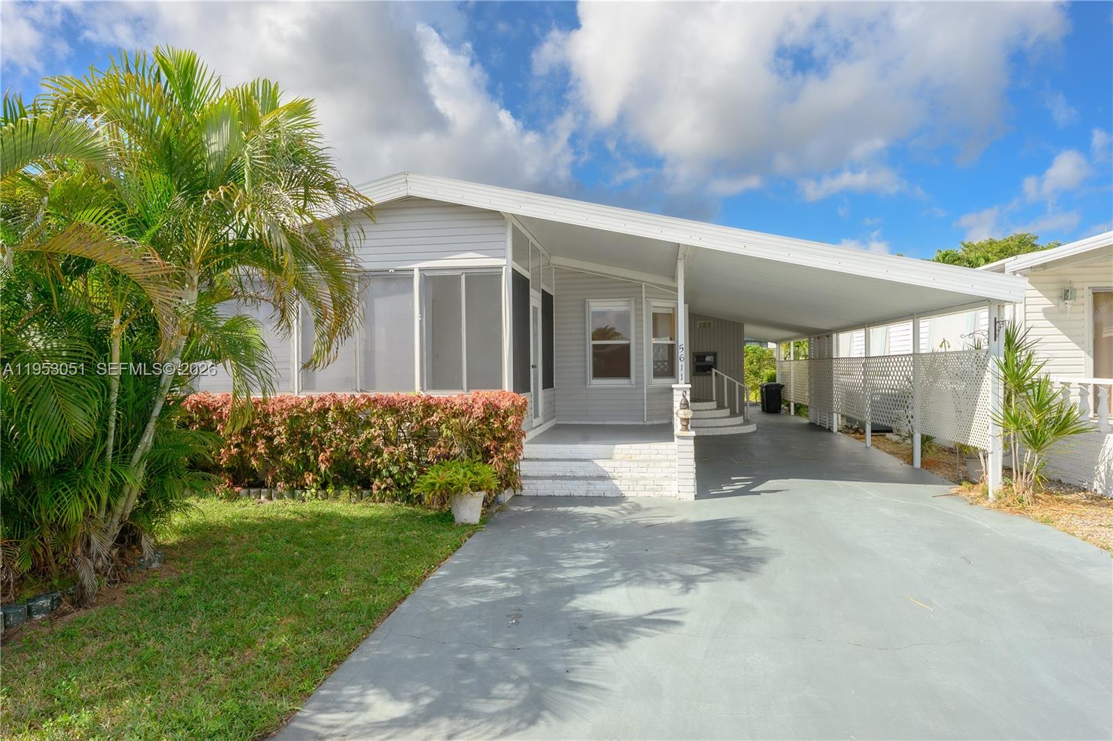 Beautifully updated and remodeled 2-bedroom, 2-bath double-wide home (built in 1990) offering comfort, space, and functionality. This well-maintained residence features a bright and inviting sunroom, perfect for relaxing or enjoying your morning coffee, along with generously sized bedrooms and a spacious layout ideal for everyday living. The home includes a carport, convenient storage shed, and a large, open yard with plenty of room for outdoor enjoyment, gardening, or entertaining. Financing is available. Community regulations apply: rentals are not permitted during the first three years of ownership. Close proximity to major highways.