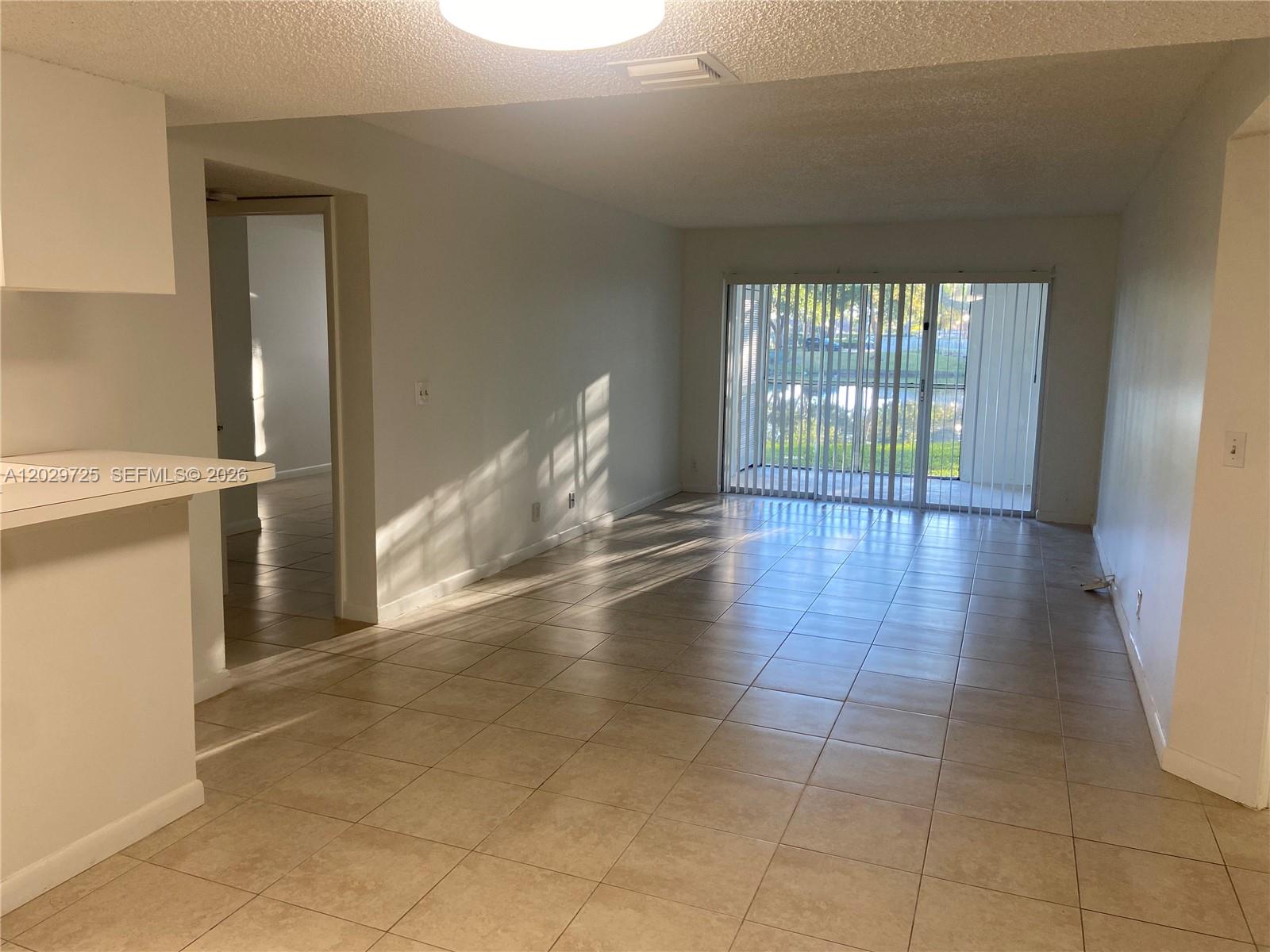 Beautifully remodeled first-floor corner unit with serene lake views! This spacious 2-bedroom, 2-bath condo features a desirable split-bedroom floor plan for added privacy, completely renovated bathrooms, new stainless steel appliances, and an in-unit washer and dryer. Located in Citation Way, Coral Springs, close to top-rated schools, parks, shopping, dining, and major highways. Schedule your showing today!