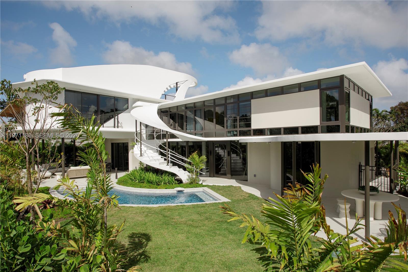 Welcome to Skyfin, a completely reimagined architectural masterpiece in the heart of the guard-gated Morningside community. Originally designed by renowned architect Rufus Nims, this iconic residence has been thoughtfully transformed with the design of architect Gabriela Liebert into the modern showpiece it is today.

Designed for exceptional entertaining, Skyfin boasts over 4,200/sqft of interior space and about 2,100/sqft of terrace, balcony, and rooftop space, seamlessly blending indoor sophistication with elevated outdoor living. Inside, every detail speaks to craftsmanship and intention, from the fully integrated Miele appliances to the bespoke Boffi kitchen and rich oak wood flooring.

This is more than a home; it is tomorrow’s icon. Don’t miss this once-in-a-lifetime opportunity to own a residence that defines the future of Miami design, today.