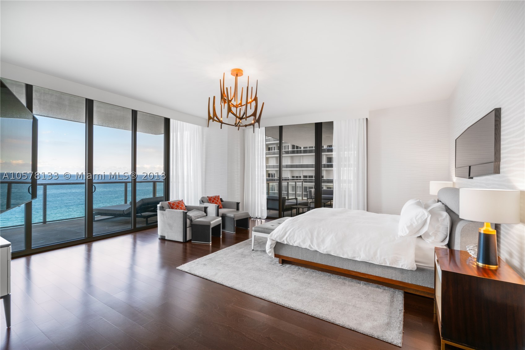 This flow-through residence at the St. Regis Bal Harbour offers 270 degree sweeping views of the Atlantic Ocean and Miami skyline from its floor-to-ceiling glass walls and extra deep terraces. It is the lowest priced south-facing unit, the building’s premier side. The unit features a fully equipped chef’s kitchen with wine storage & dual ovens, generous living areas with a separate family room, and Lutron shades and blackout curtains throughout. The St. Regis offers bespoke living at its finest, with 24 hour concierge, resident butler, four pools, private oceanfront cabanas, restaurants, beach-service, full service spa and separate residents amenities, all while being located directly across the street from the world-renowned Bal harbor Shops. Furniture is available separately.