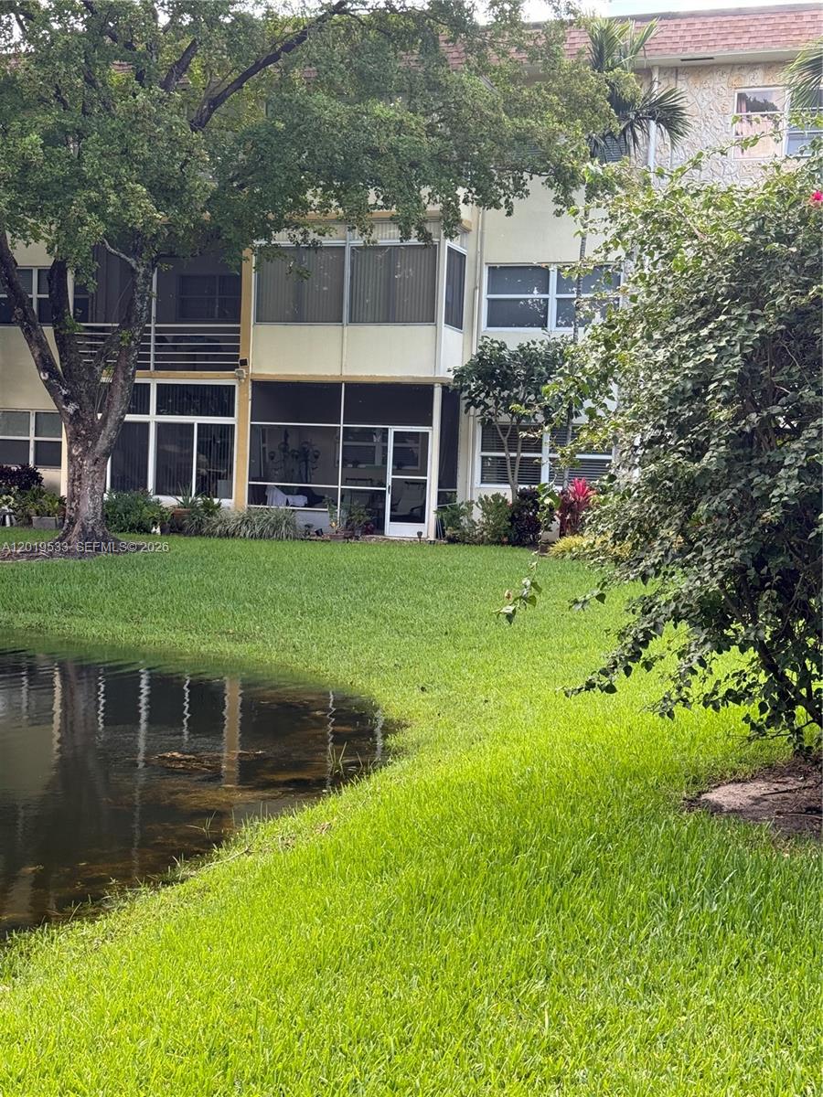 Nestled in the tranquil neighborhood of Hawaiian Garden is this lovely garden view home. Conveniently located in Lauderdale Lakes only walking distance from the Florida Memorial Hospital, 15 mins to beach, Sawgrass and Broward Mall and other attractions. This community has 2 sparkling pools with a full bathroom, a card & game room.  Also in the clubhouse, there is a billiards, gym, library, kitchen and entertainment hall. The landscape is absolutely breathtaking and the property is well kept. Free internet service! Please allow 24 hrs for showing request on supra lockbox, but agent must accompany their buyer. This is a 55+ community. 650 min credit $30k min. income per association. Call listing agent for showing instructions as the property is tenant occupied. Thank you!