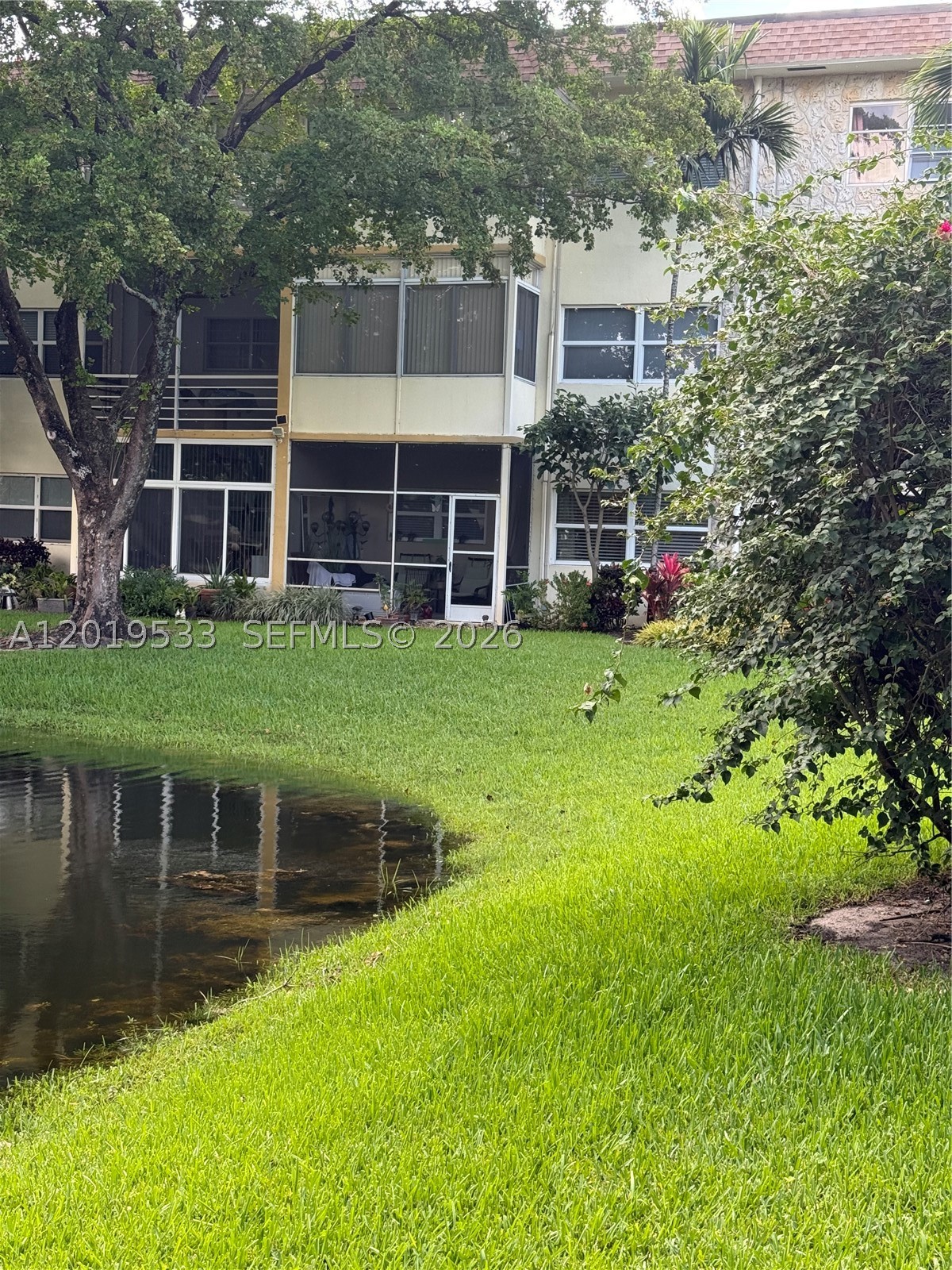 Nestled in the tranquil neighborhood of Hawaiian Garden is this lovely garden view home. Conveniently located in Lauderdale Lakes only walking distance from the Florida Memorial Hospital, 15 mins to beach, Sawgrass and Broward Mall and other attractions. This community has 2 sparkling pools with a full bathroom, a card & game room.  Also in the clubhouse, there is a billiards, gym, library, kitchen and entertainment hall. The landscape is absolutely breathtaking and the property is well kept. Free internet service! Please allow 24 hrs for showing request on supra lockbox, but agent must accompany their buyer. This is a 55+ community. 650 min credit $30k min. income per association. Call listing agent for showing instructions as the property is tenant occupied. Thank you!