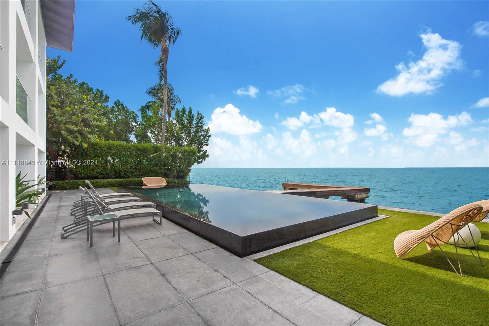 ONE & ONLY Open Bay Waterfront Home located at the end of Mashta Dr., the most prestigious street on Key Biscayne. COMPLETELY RENOVATED IN 2015, wide open living spaces ideal for entertainment and spectacular unobstructed ocean views.  The Second floor includes 5 Bedroom/ 6.5 Baths. Unique residence has a multilevel structure with master suite on the last floor and expansive waterfront balcony. Enjoy luxury features including an outdoor summer kitchen, wine cellar, and two separate maid’s quarters, Infinity pool, private expansive terraces, gym and private dock, which can accommodate yachts up to 50 feet. Two car garage with storage area, surround sound and security cameras throughout the house.