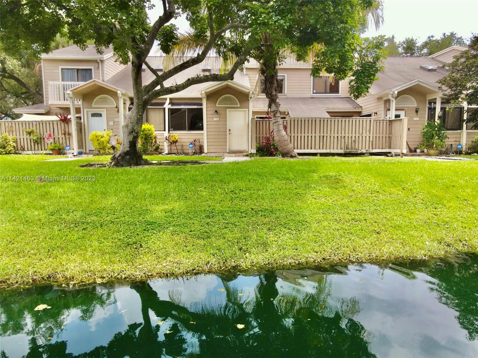 Fully remodeled 2 bedroom, 2 bathroom Townhome with a large open loft. When you walk around to the entry door, you notice a spectacular lagoon with a fountain right out front of the home. There is a huge patio area, with french pattern travertine stone floor, fully fenced giving you lots privacy to enjoy the beautiful Florida weather. When you walk inside you immediately see the volume ceilings leading all the way up to the loft with lots of natural sunlight from the windows and skylights shining down. In the kitchen you have upgraded cabinetry, granite countertops, and stainless steel appliances with a beautiful glass mosaic tile backsplash and app controlled color changing LED lights. Large master bedroom with remodeled bathroom downstairs. Upstairs you have the 2nd bedroom and bathroom.