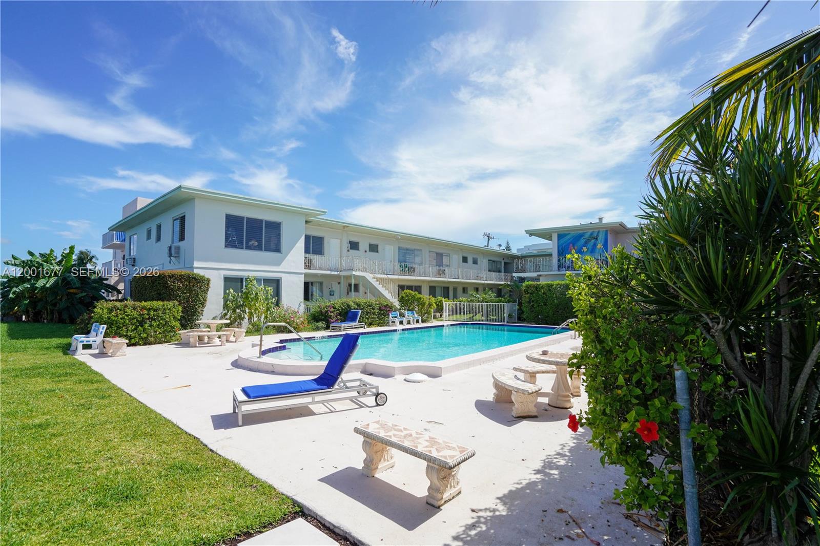 Super cute 1-bedroom in a charming garden-style waterfront building right on the Intracoastal in North Beach. This 663 SF unit is in great condition, with tile floors throughout and a bright, comfortable feel. The kitchen has been updated and includes a gas stove, dishwasher, and stainless steel fridge, plus a back door off the kitchen.
The building has that classic Art Deco charm, with a pool and a brand-new deck overlooking wide bay views—perfect spot to relax and enjoy the water.
Great option to live in or invest. Easy walk to restaurants, markets, and everything you need nearby. Definitely worth seeing in person!