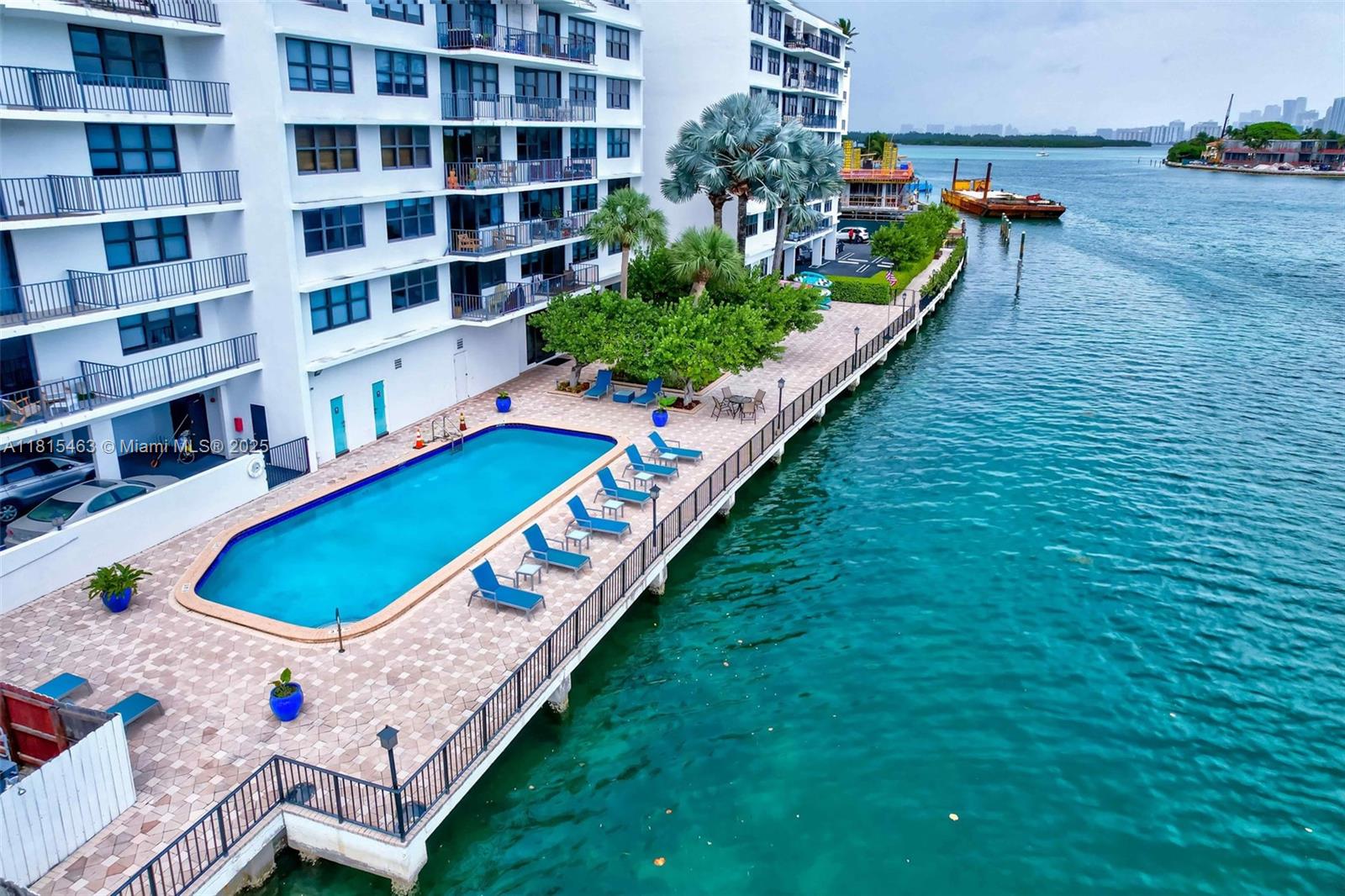 Bright and Spacious 2-Bed, 2-Bath Condo with Stunning Sunset Views. Enjoy living in The Belmont, a boutique 7-story waterfront building in the highly desirable Bay Harbor Islands. Enjoy spectacular sunset views from your living room or unwind  by the canal front pool.  You will feel the tranquility of island living while being just a short walk to the beach, top-rated restaurants, shopping, and 10 minute drive from highly acclaimed Grade A K-8 school. New kitchen with  stainless steel appliances, new A/C, impact windows, your own storage space and bike room.  Experience a rare blend of privacy, location, and amenities in one of Miami's most sought-after neighborhoods. **PLEASE NOTE! Maintenance Fees include: Electricity, cable, internet, water, garbage disposal, concierge service, water-front pool, party room, kayak storage racks, private storage space, bike room and Building Insurance.** Send me your offer! Motivated Seller!