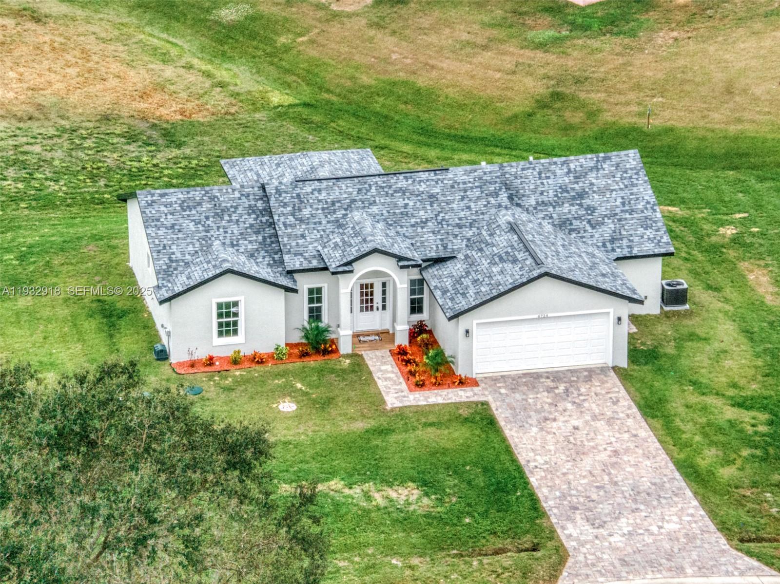 BEAUTIFUL NEW CONSTRUCTION PROPERTY (2025) IN THE HEART OF CENTRAL FLORIDA, FEATURING THREE BEDROOMS, TWO BATHROOMS, A SPACIOUS KITCHEN, AND A WARM AND INVITING LIVING ROOM AND FAMILY ROOM. ENJOY A LARGE, WELL-LOCATED CORNER LOT IN THE BEAUTIFUL AND WELL-MAINTAINED SPRINGLAKE NEIGHBORHOOD, READY FOR FUTURE PROJECTS SUCH AS A POOL, GAZEBO, PLAYGROUND, ETC. THE HOMEOWNERS ASSOCIATION'S FEES ARE INCREDIBLY LOW AT ONLY $50.00 A YEAR, COVERING THE USE OF COMMON AREAS, LANDSCAPING, AND THE OVERALL UPKEEP OF THIS LOVELY COMMUNITY. DON'T MISS THIS OPPORTUNITY!!