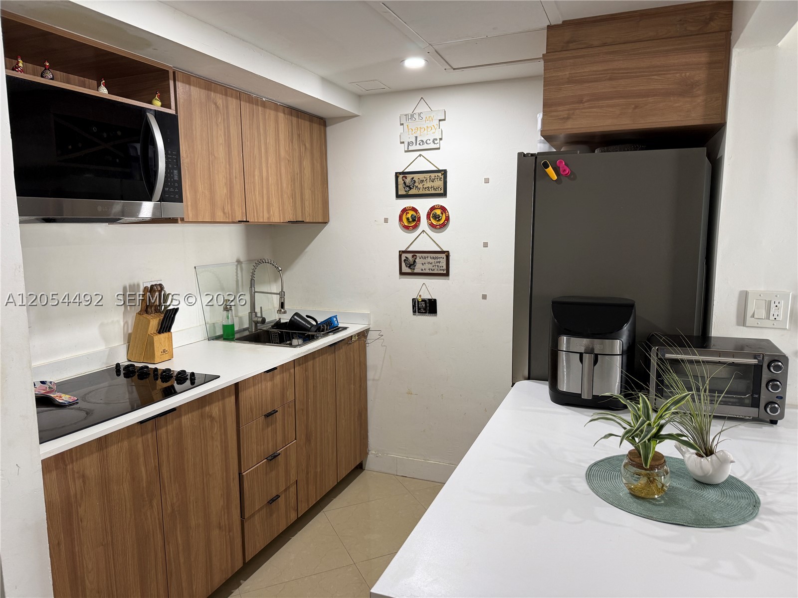 EL BOSQUE AT LITTLE HAVANA - Residential Lease