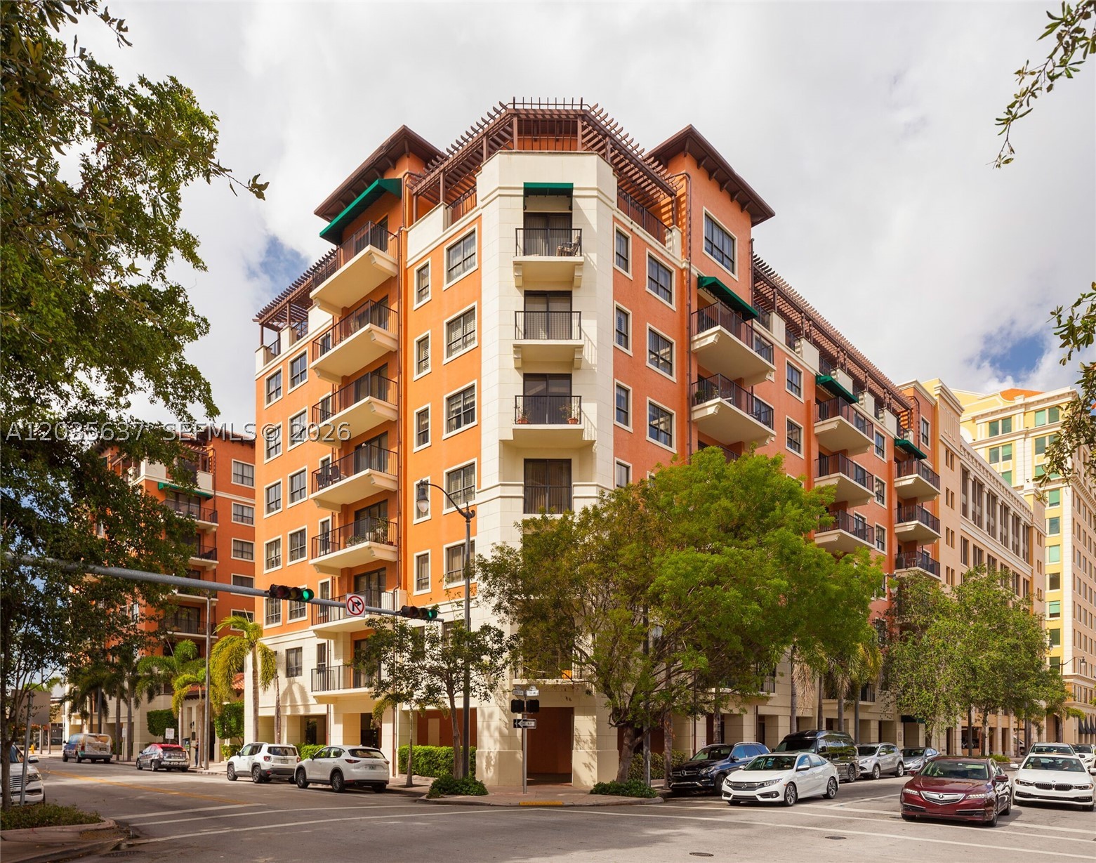 Best urban location! Nestled between Historic Miracle Mile & The Magnificent Plaza, this immaculate 97-unit boutique building features a serene Zen garden entry. Stunning unit boasts 2 spacious en-suite bedrooms, a guest half-bath, a modern kitchen with white quartz counters, wood flooring, and a large balcony overlooking vibrant city views. Maintenance fee conveniently covers everything except electricity: 24-hr front desk, on-site manager, water, cable, high-speed internet, sewer, recycling, pest control, and 2 parking spaces (one conveniently assigned on your floor). Steps to world-class dining, theatres, museums, and shops. Free trolley & Freebee available!