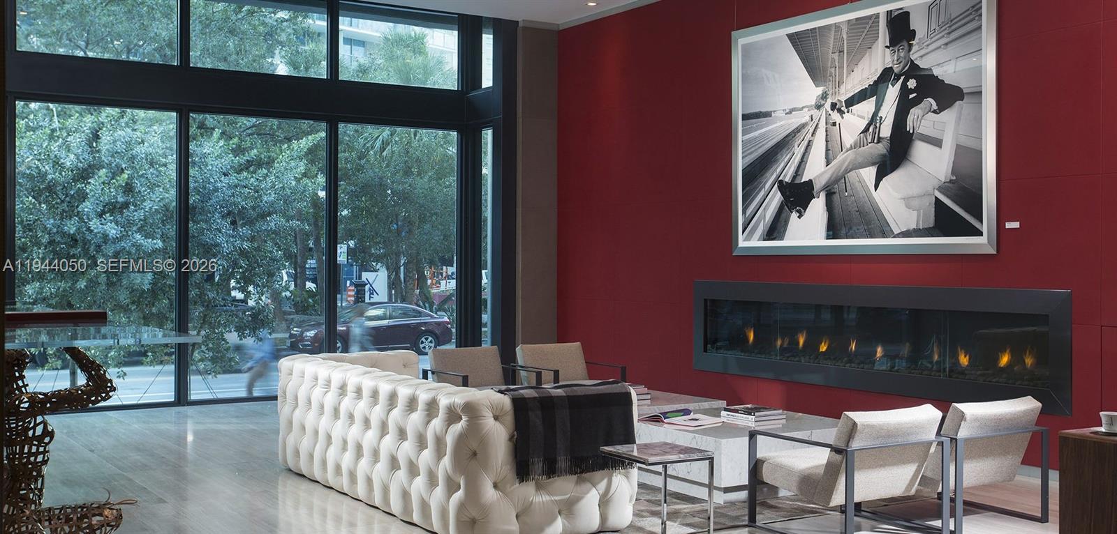 1-bedroom loft residence at The Bond on Brickell, a 44-story luxury condominium completed in 2016. This unit features double-height ceilings, floor-to-ceiling windows, an open-concept layout, and abundant natural light. The bedroom offers a large walk-in closet, and the residence includes 1.5 bathrooms. Modern finishes include European-style cabinetry, premium appliances, and quality materials throughout. Building amenities include a resort-style pool and sundeck, fitness center, clubroom, business center, concierge, and valet parking. Prime Brickell location within walking distance to Brickell City Centre and Mary Brickell Village, with convenient access to South Beach and Miami International Airport.