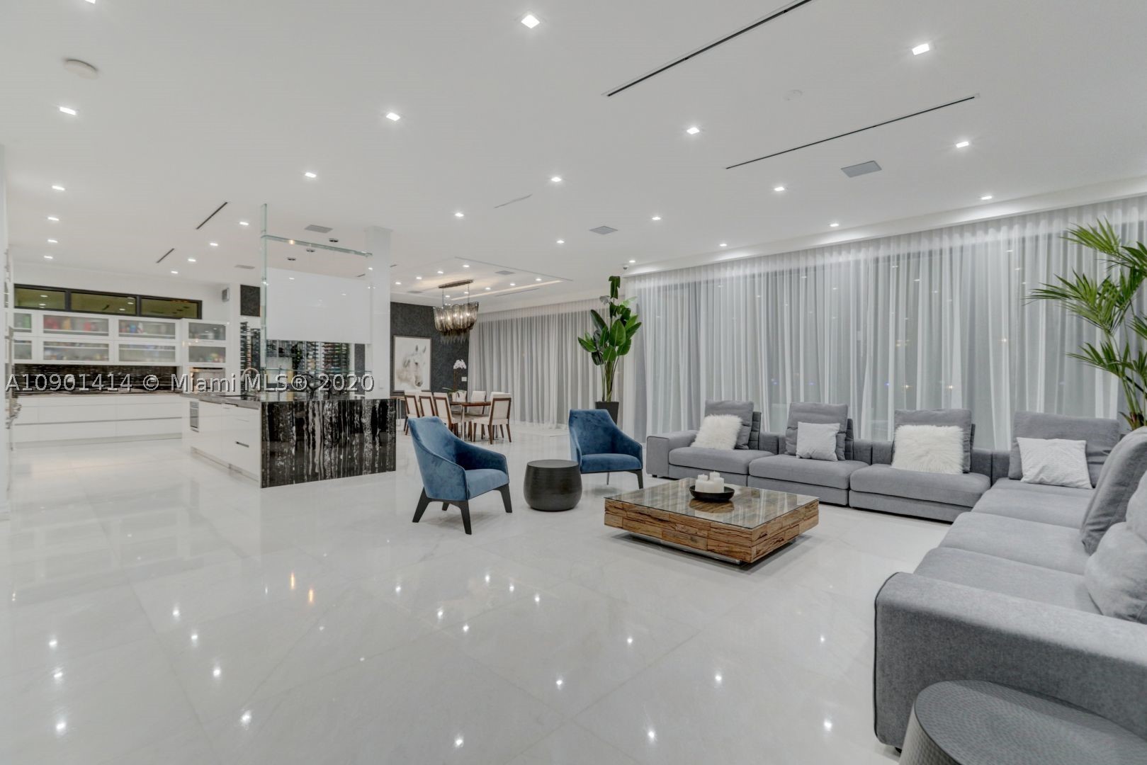 Welcome to this gorgeous, contemporary waterfront home in Seven Isles, one of Fort Lauderdale's most desired areas. Enjoy the beautiful canal views from your open concept gourmet gas kitchen and dining area that leads out to the pool. Home also includes a living area with its own dedicated wine cellar, and open space rooftop with full 360 degree views. Perfect for boaters with a 76 ft dock and direct ocean access. Walking distance to Fort Lauderdale's famous beaches and restaurants, and just a short drive to 2 international airports.