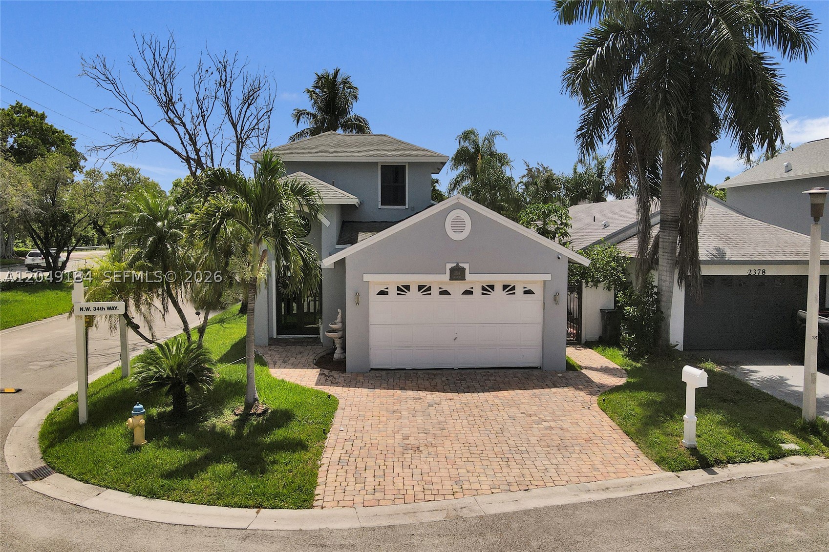 Renovated With Comfort And Everyday Living In Mind, This Move-In-Ready 3-Bedroom, 2.5-Bath Home Offers Bright, Airy Interiors, Inviting Living Spaces, A Private Backyard Retreat, And Resort-Style Community Amenities. Situated On A Desirable Corner Lot In The Gated Community Of Centura Parc, The Home Features Impact Windows And Doors, Porcelain Flooring, An Epoxy-Coated Garage Floor, And Numerous Upgrades Throughout. The First-Floor Primary Suite Adds Privacy And Convenience.

The Backyard Offers A Private Retreat Of Its Own. Fully Fenced And Surrounded By Tropical Landscaping, The Space Features A Pool And Spa, Upgraded Limestone Pavers, Artificial Turf, And A Covered Patio Enhanced With Custom Shade Sails. Multiple Outdoor Areas Provide The Perfect Setting For Dining, Entertaining, Or Simply Relaxing.

The Community Offers A 24/7 Manned Entrance Gate, Cable, Internet, A Clubhouse, Fitness Center, Heated Pool, Sauna, Separate Indoor And Outdoor Jacuzzis For Men And Women, A Toddler Playground, Tennis, Pickleball, And Basketball Courts, Banquet Facilities, And Additional Amenities.

Conveniently Located Near Schools, Shopping, Dining, Parks, And Major Highways, This Home Delivers Comfort, Functionality, And The South Florida Lifestyle Buyers Are Looking For. Some Images Have Been Virtually Staged. Schedule Your Private Showing Today. A Minimum Of 24 Hours’ Advance Notice Is Required.