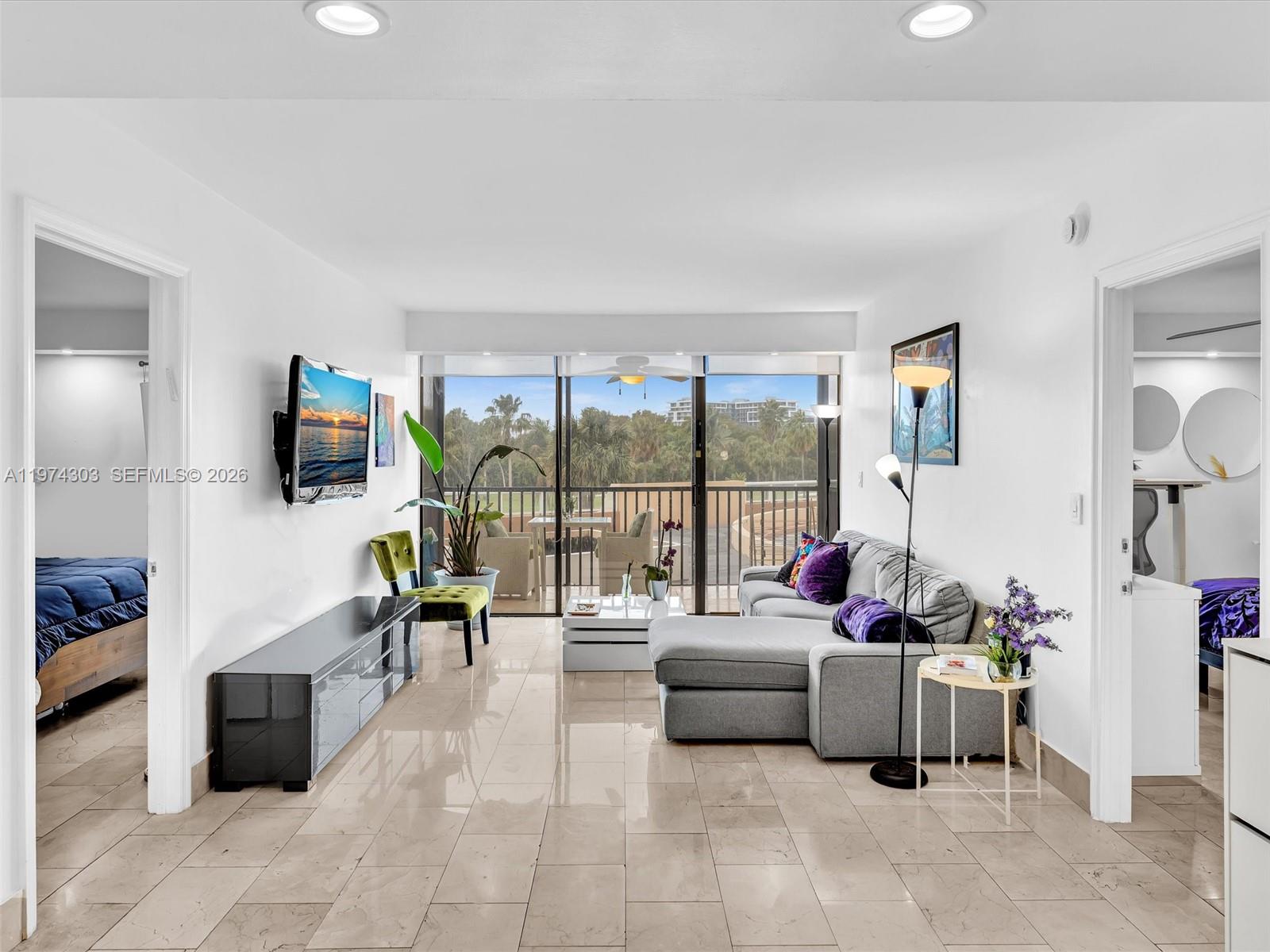 Enjoy full condo amenities without ever stepping into the elevator. This move in ready, beautifully renovated 2 bedroom, 2 bathroom with balcony residence offers 1238 square feet of spacious living in one of Aventura’s most peaceful locations, with spectacular golf and sunset views. You are steps from jacuzzi, pool, and the laundry room. One Covered Parking spot is included.

A very rare opportunity, units with this convenient access almost never become available. Perfect for buyers who want the full condo lifestyle with pool, gym, sauna, and security, without dealing with elevators or long hallways.

Ideally positioned at the base of the building, simply enter the lobby, turn right, take a few steps up, and you are home. Easy and direct access.

The split floor plan offers privacy, a generous kitchen, and spacious living and dining areas overlooking the golf course. Enjoy breathtaking sunsets in a quiet and relaxing setting.

Renovated interior with an almost brand new AC, a Nest thermostat, wine cooler. Storage locker included.
Amenities include heated pool, jacuzzi, sauna, gym with brand new equipment, outdoor deck with golf views, and free abundant guest parking. Low HOA includes internet, cable TV, and pest control.

Two blocks from Aventura Mall and close to the Don Soffer trail. Rarely available in Aventura.