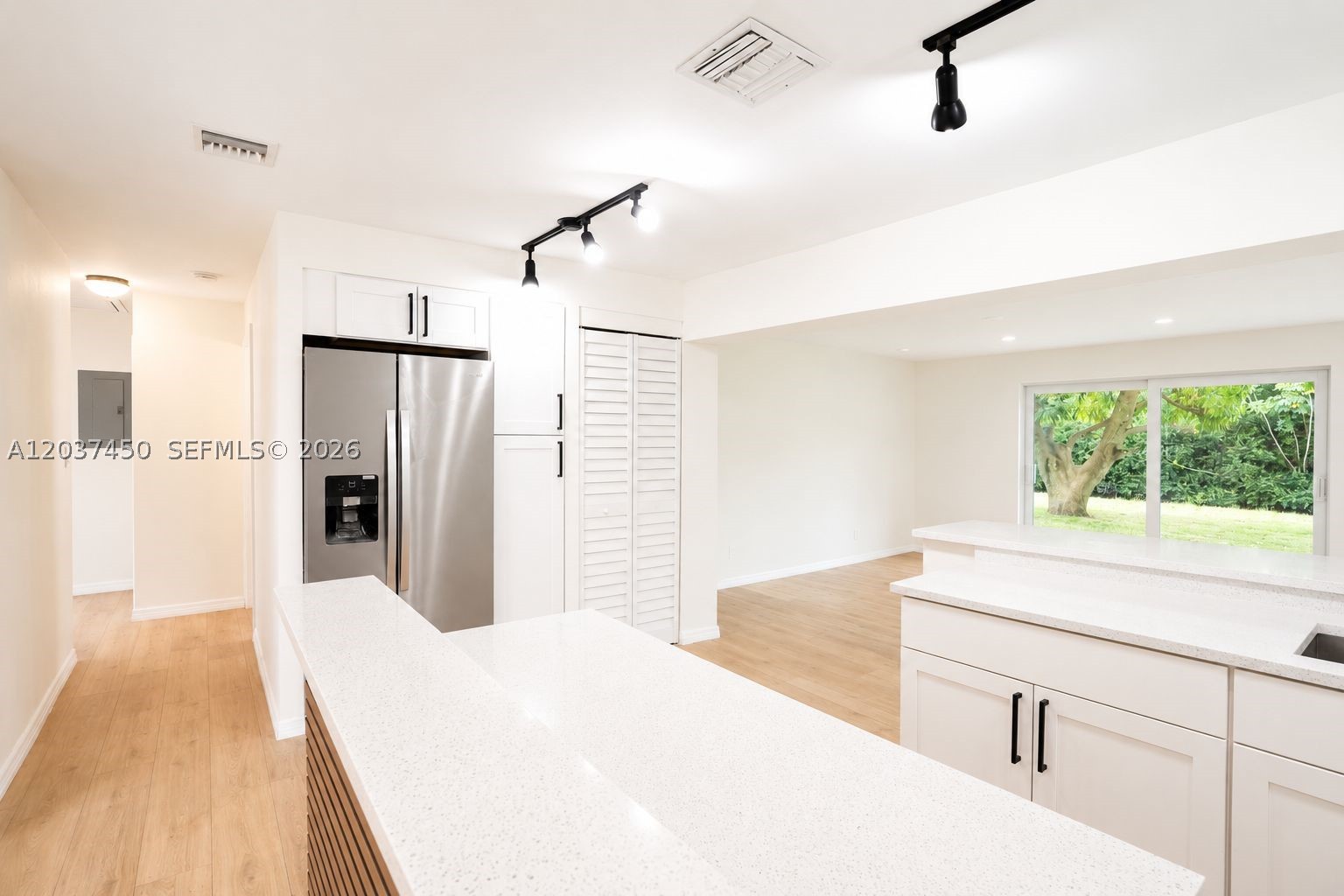 LARGE, BEAUTIFUL & SPACIOUS waterfront home with open floor plan & tons of natural light, in great area this home features 4 Bedrooms 2 Bathrooms! Newer Roof, Impact Windows, new kitchen cabinets with quartz counter tops, updated electrical & plumbing, recessed LED lighting throughout. MUST SEE TO APPRECIATE!!