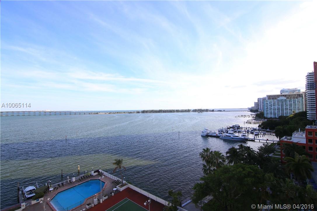 Enjoy beautiful water and city views in a wraparound balcony! Updated corner unit that has just been freshly painted. Tile throughout. Building offers 24 hour security, tennis court, gym, pool, party room and property management on site. Plenty of guest parking spots plus street parking. Washer and dryer located on every other floor (10th/12th floor). Easy to show.