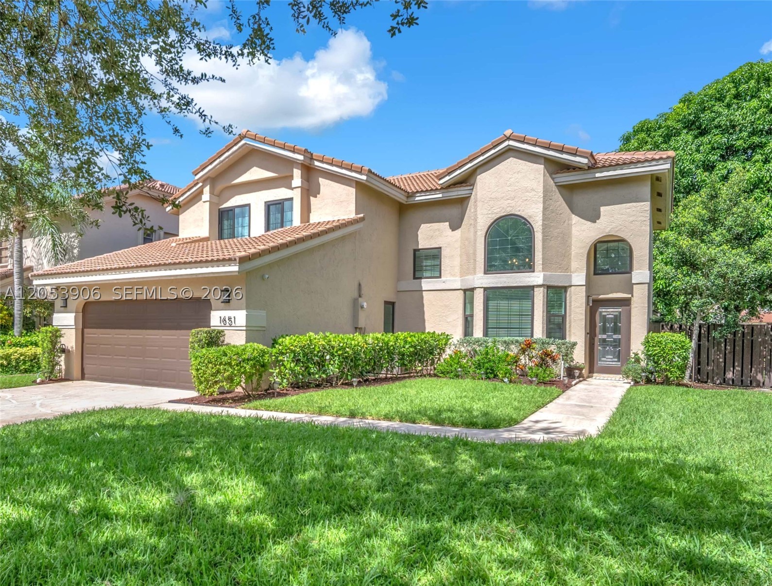 Welcome to this beautifully updated 4-bedroom, 3-bathroom home located in the highly sought-after Estates section of Fountain Spring. This spacious residence features a stunning, newly remodeled kitchen complete with custom wood cabinetry, quartz countertops, and stainless-steel appliances.  Large primary suite offering a spa-inspired bathroom with an oversized walk-in shower featuring multiple shower heads, a dual-sink vanity, and generous walk-in closets. First floor bedroom and full bathroom provide the ideal setup for guests, in-laws, or a home office. Impact glass, LED lighting, and smart home technology throughout this home.   Residents enjoy access to Fountain Spring’s beautifully maintained community pool and clubhouse, as well as the expansive neighborhood park featuring a playground, basketball courts, pickleball courts, and plenty of open green space for outdoor recreation.