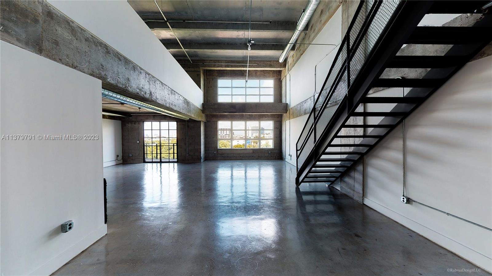 Industrial Loft with 20' ceilings,  concrete floor through out large open floor plan with lofted mezzanine level with Master bedroom and bathroom. Tons of natural light. Italian kitchen cabinets, stainless steel appliances and concrete counter tops. W/D in unit and 1 covered parking. Call or Text LA for showing instructions. Tenant occupied 24 hr notice to show.