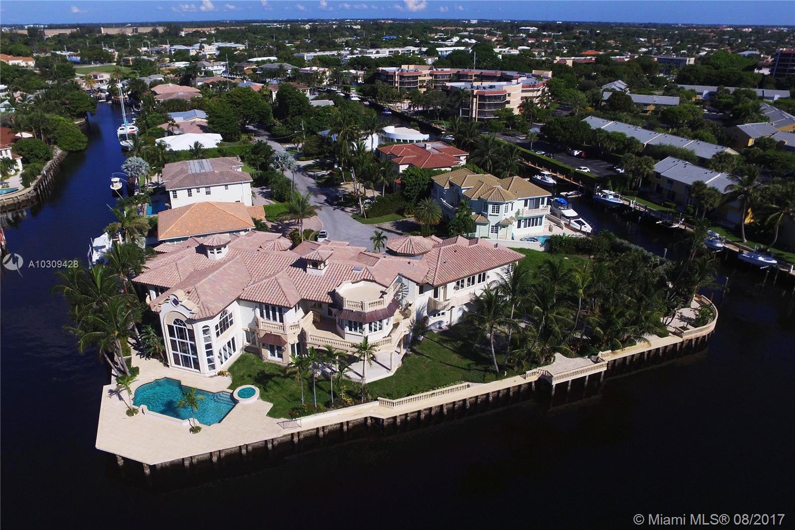 IMPRESSIVE DOUBLE POINT LOT DIRECT TO INTRACOASTAL! This is a special situation, renovation project opportunity. This impressive waterfront estate boasts a very rare 27,290 sf double point-lot with 440' of water frontage, 250' directly to the intracoastal with deep water. With 14,000 sf of living space, this offering represents an extraordinary opportunity for investing in one of the most affluent and desirable communities in the US. The estate is gutted and ready to receive new custom interiors, allowing the new owner to create a masterpiece tailored to his/her specific lifestyle and needs; in half the time, and many millions less than comparable homes. Boca Ratón Airport is only 2 miles away, capable of handling even G650 and BBJ's  Permitted plans and completion proposal are available.