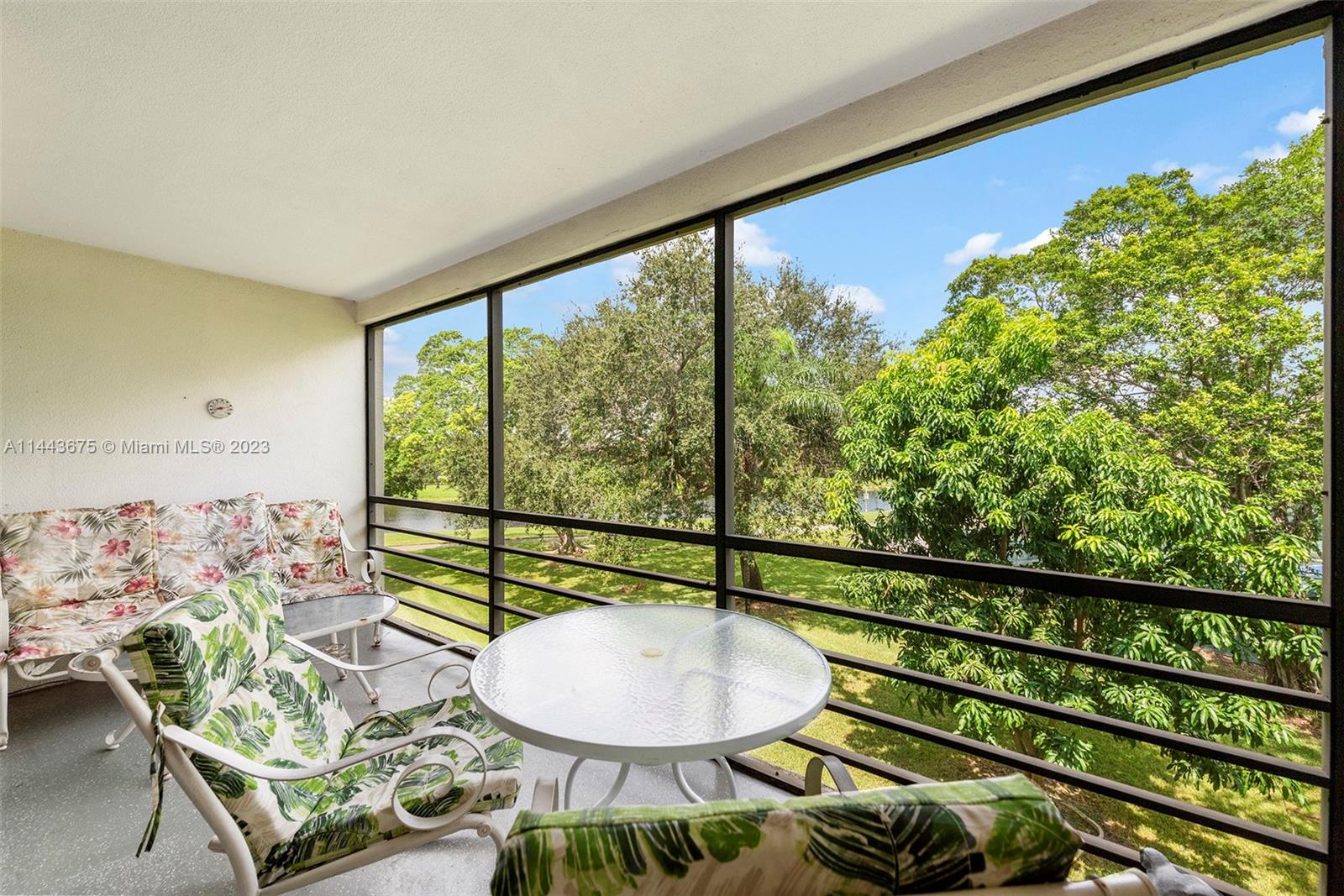 Welcome to the warm community of Cypress Bend. Spacious & bright, this condo was formerly 2 bedrooms converted into one magnificent 1 bedroom home. The conversion opened up the living room for maximum entertaining, but the second bedroom can easily be converted back.  Sliding doors open up to the screened balcony where you can enjoy the fresh air and views of the trees and lake. The building has laundry facilities on each floor. Cypress Bend itself is constantly maintained and manicured, and includes amenities such as Basketball Courts, Clubhouse-Clubroom, Exercise Room, Heated Pool, Library, and Tennis!