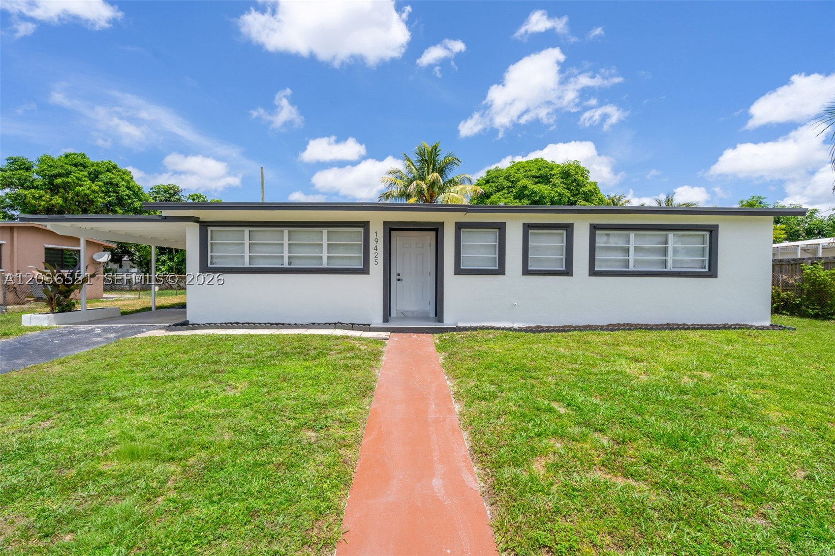 Stunning fully remodeled 4BR/3BA home located in the established Carol City area of Miami Gardens. Features brand-new PVC plumbing throughout, custom kitchen cabinetry, built-in closets, and modern finishes. Flexible floor plan includes a private separate living space ideal for extended family, guests, or a home office. Enjoy a spacious patio with Miami-style charm, perfect for entertaining. Conveniently located near Hard Rock Stadium, schools, shopping, dining, and major highways. Move-in ready and easy to show with Lockbox. Schedule your showing today!