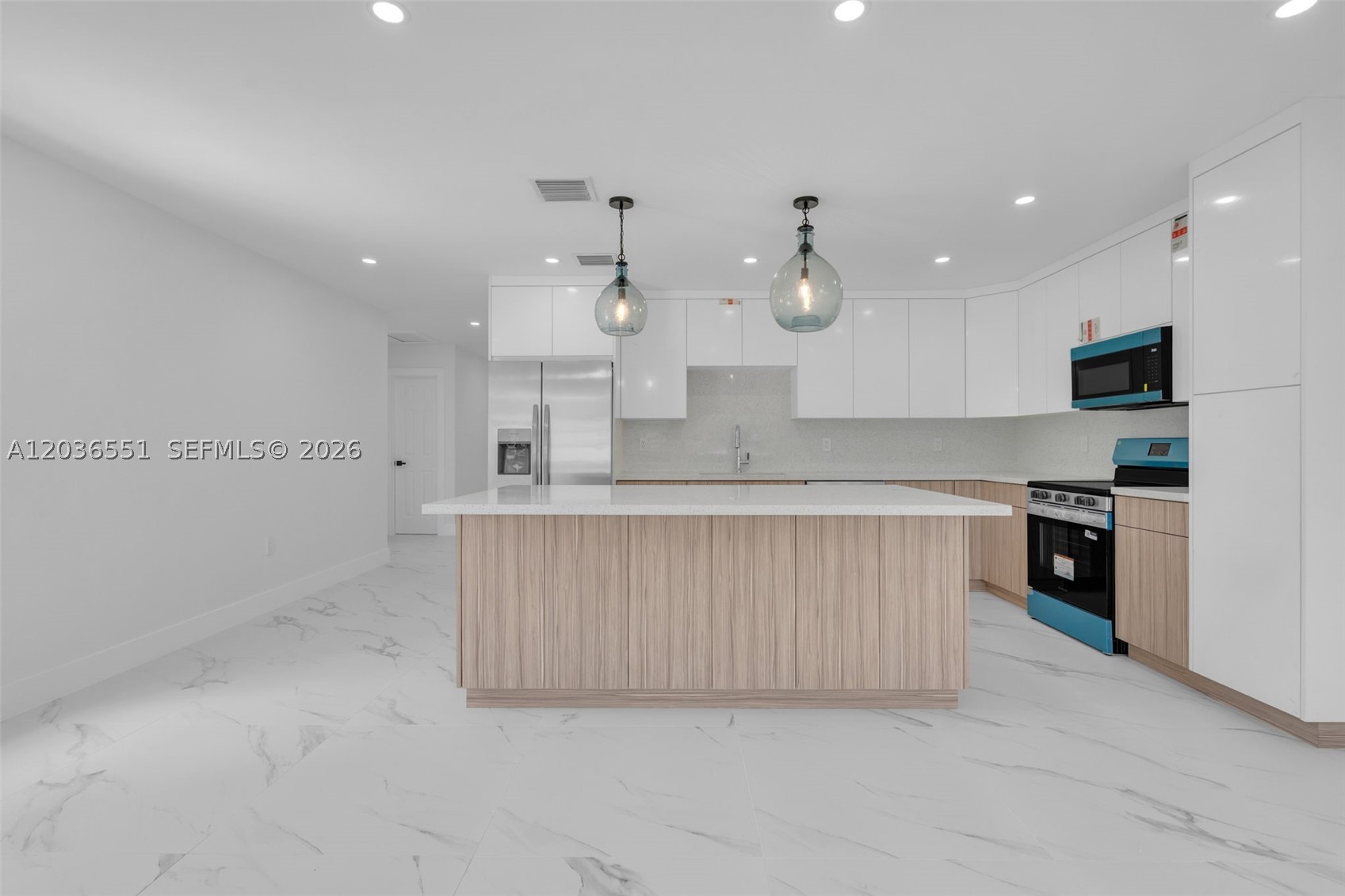 Stunning fully remodeled 4BR/3BA home located in the established Carol City area of Miami Gardens. Features brand-new PVC plumbing throughout, custom kitchen cabinetry, built-in closets, and modern finishes. Flexible floor plan includes a private separate living space ideal for extended family, guests, or a home office. Enjoy a spacious patio with Miami-style charm, perfect for entertaining. Conveniently located near Hard Rock Stadium, schools, shopping, dining, and major highways. Move-in ready and easy to show with Lockbox. Schedule your showing today!