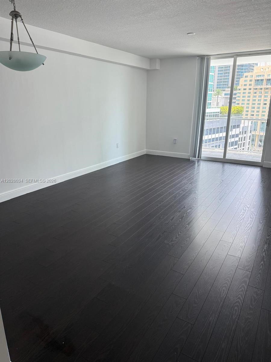 Great opportunity in the heart of Brickell! Spacious and updated 1 bed / 1.5 bath, Located in the heart of the vibrant Brickell area, this unit boasts a spacious bedroom and a large balcony. With its prime location, you'll have easy access to the vibrant city life, trendy dining spots, shopping centers, and entertainment options. Take advantage of the building's top-notch amenities, including a fitness center and swimming pool. Washer and dryer in unit, Basic cable is included. This unit comes with 1 assigned and covered parking.