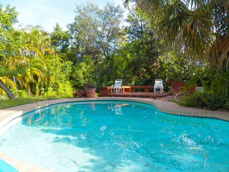 Less than assessed value! Least expensive...Large lot in Cherry Grove. Best buy guardianship court sale in fantastic neighborhood of larger homes close to baptist hospital, needs total updating but very open floor plan huge living and dining room great ki tchen with breakfast area ,maids room,1.5 Car garage, 600'ft covered terrace overlooking free form large pool patio and fenced yard 14000' lot cash deal with proof of funds as is! Won't last long! Land value! Best great house to remodel!