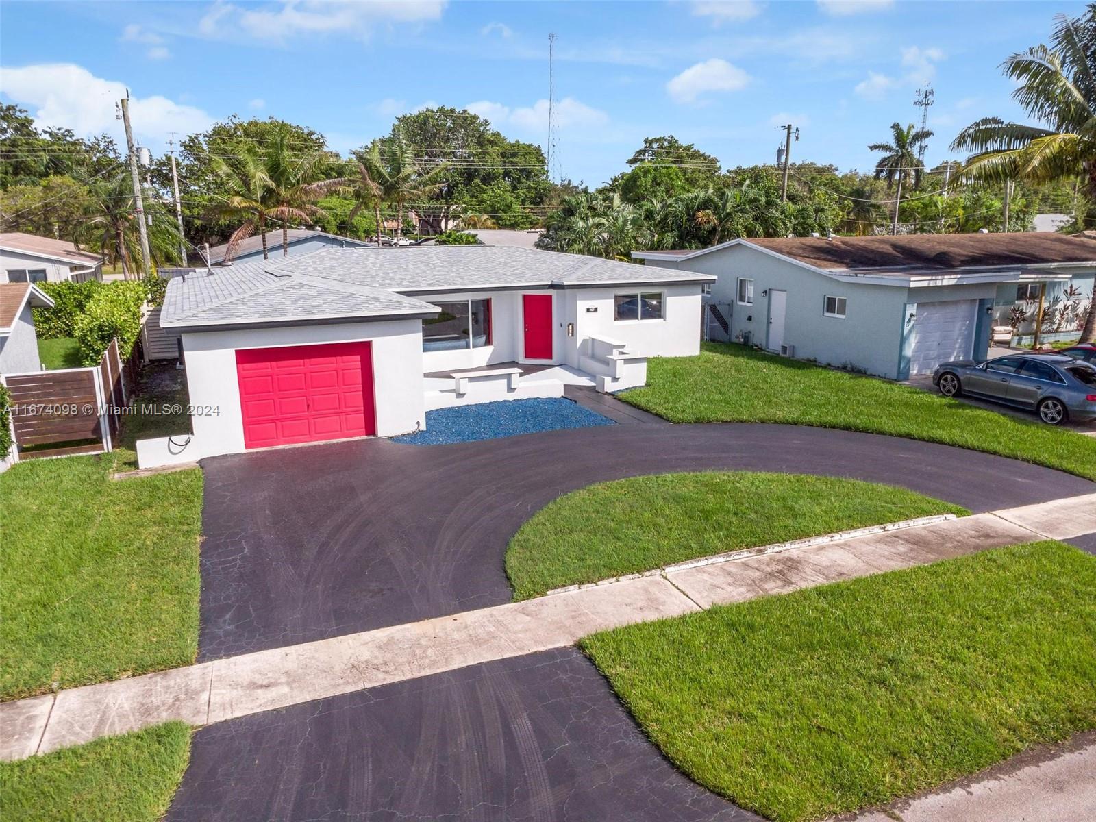 WOW. You should run to see this house.  What is the first thing you usually ask about a home? How old is the roof? This is the ideal home for your family because it has a BRAND NEW ROOF, BRAND NEW A/C AND DUCTWORK AND IS READY FOR YOU. What a great place to call home. Short bike ride to the beach and parks and short drive to Ft. Lauderdale airport.  Walking distance to shopping and restaurants. Ready for new owner and family. Updated Master bathroom. Beautiful Mexican tile floors throughout. Currently the house is a one bedroom with an extra family room. An easy way to add a second bedroom would be to install a wall and a door. Very simple to do if you are looking for the second bedroom. Fenced backyard for your furry friends to run.  Photos added for visual effect of second room.