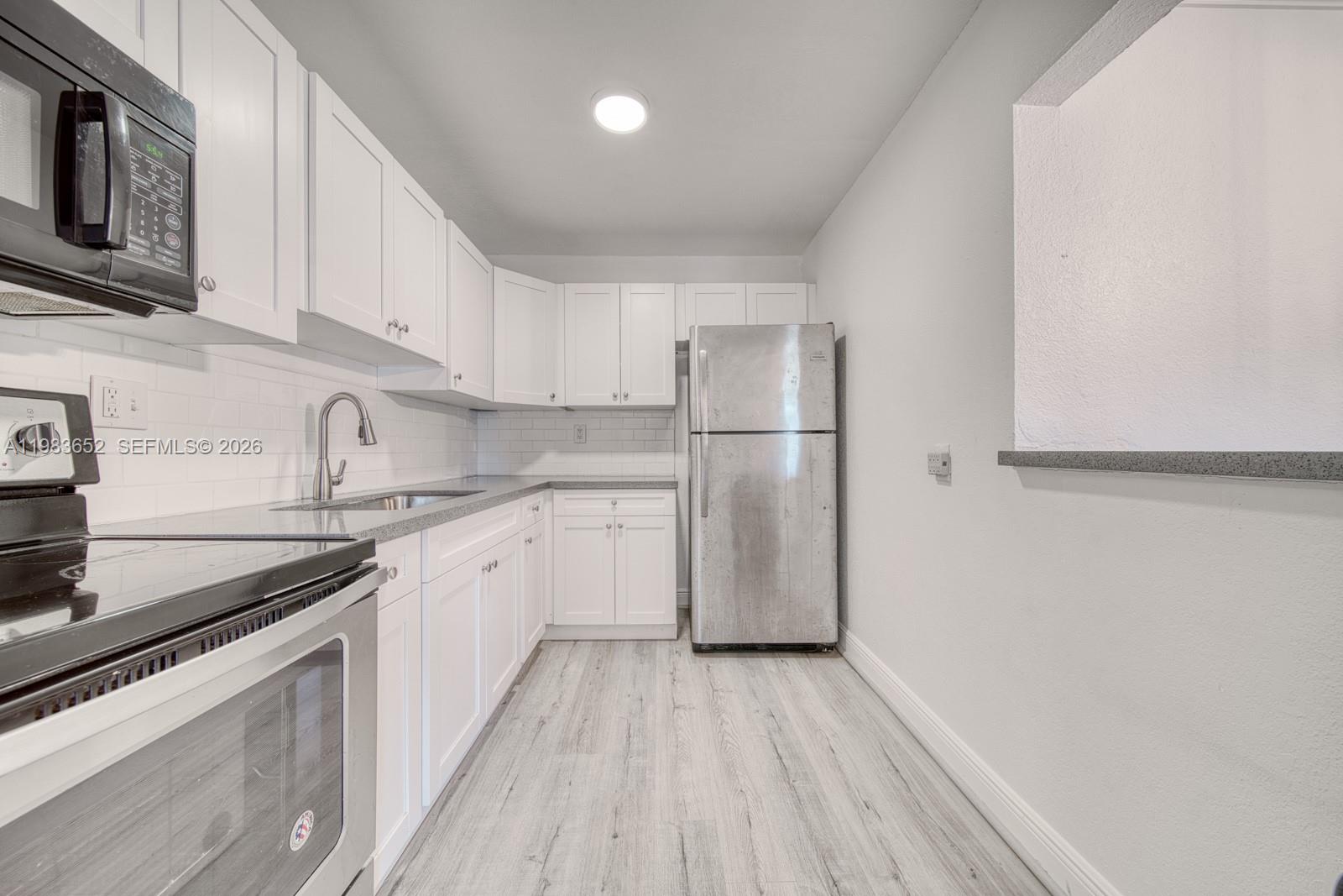 SUNSET PALMS EAST CONDO - Residential