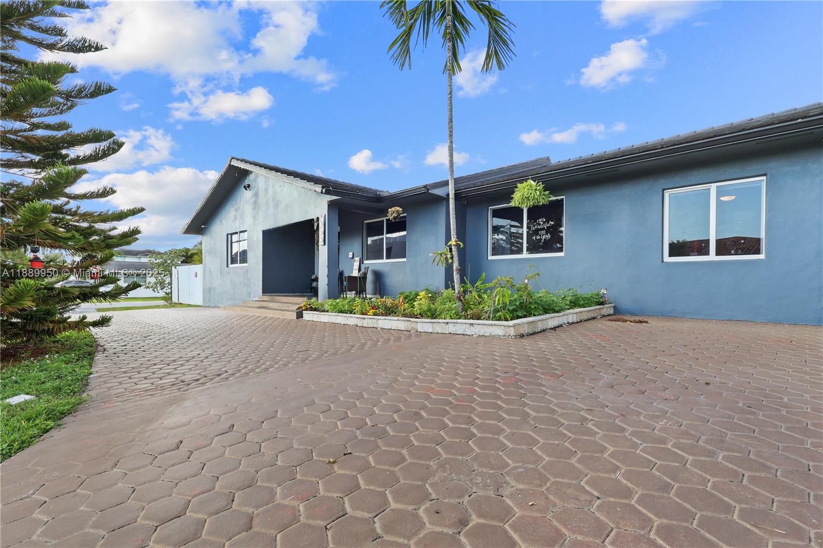 Stunningly renovated 4BD/4BA corner single-family home in a very desirable neighborhood in El Doral area. With no Home Owner Association ( HOA) something rare to find in Doral.Features two spacious master suites—perfect for families or multi-generational living. Entire home upgraded with 24x48 porcelain tiles, new electrical system w/Cat6 wiring, motion lighting & smart features. Luxury spa bath with 6x6 glass steam shower, 4 shower heads, Bluetooth lights & speakers. Two new AC units. Resort-style backyard with 34x15 saltwater pool, jacuzzi, hot tub & 30x12 covered terrace. New septic, impact windows & POE video surveillance, feels brand new! ***NO ASSOCIATION FEES***