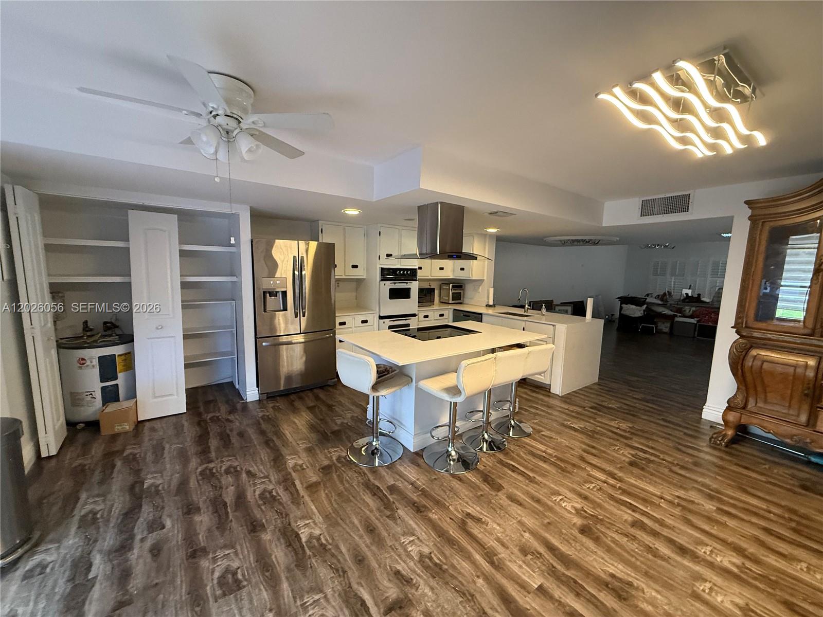 Spacious and well maintained townhome located in the desirable gated community of Venetian Park East in the heart of Hallandale Beach. This clean and move in ready residence features tile flooring throughout, generously sized bedrooms with walk in closets, ample living and dining areas, and plenty of natural light. Enjoy a private patio perfect for relaxing or entertaining, plus storm shutters for added security and peace of mind. Venetian Park offers resort style amenities including pool, tennis courts, sauna, clubhouse, and beautifully maintained grounds. Ideally located just minutes from the beach, Gulfstream Park, Aventura Mall, restaurants, shopping, and major highways. A perfect opportunity to enjoy South Florida living in a quiet and centrally located community.